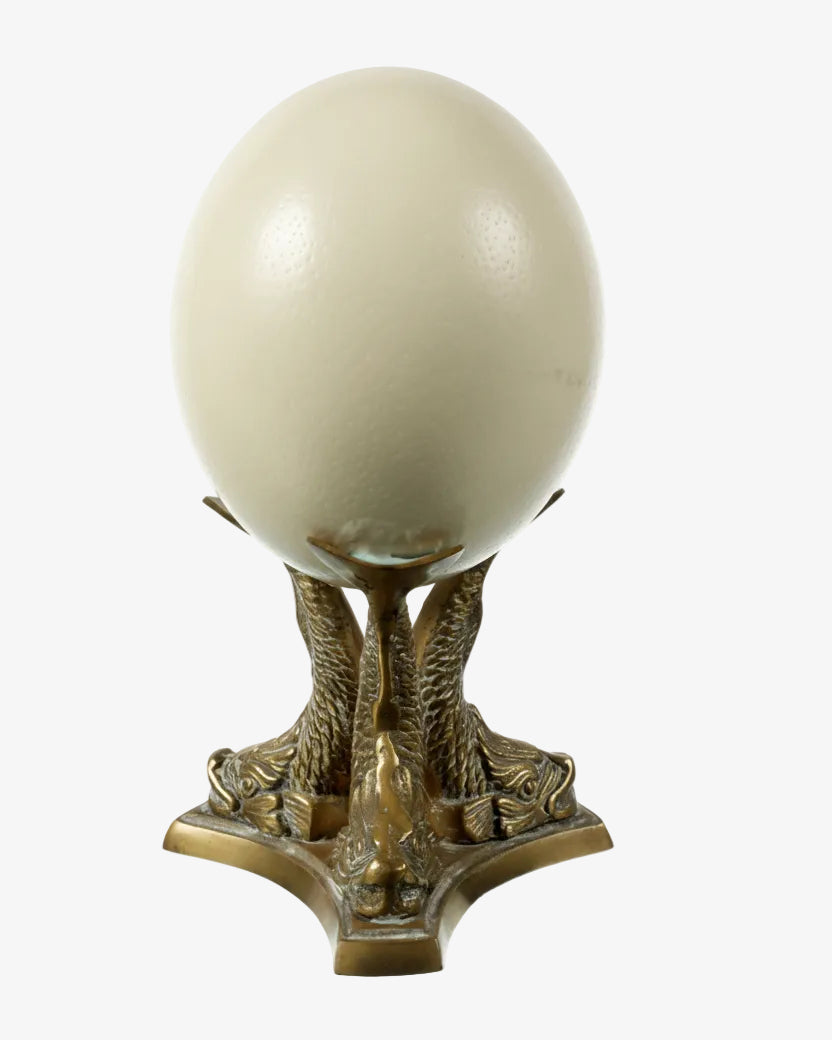 Egg centerpiece with brass base