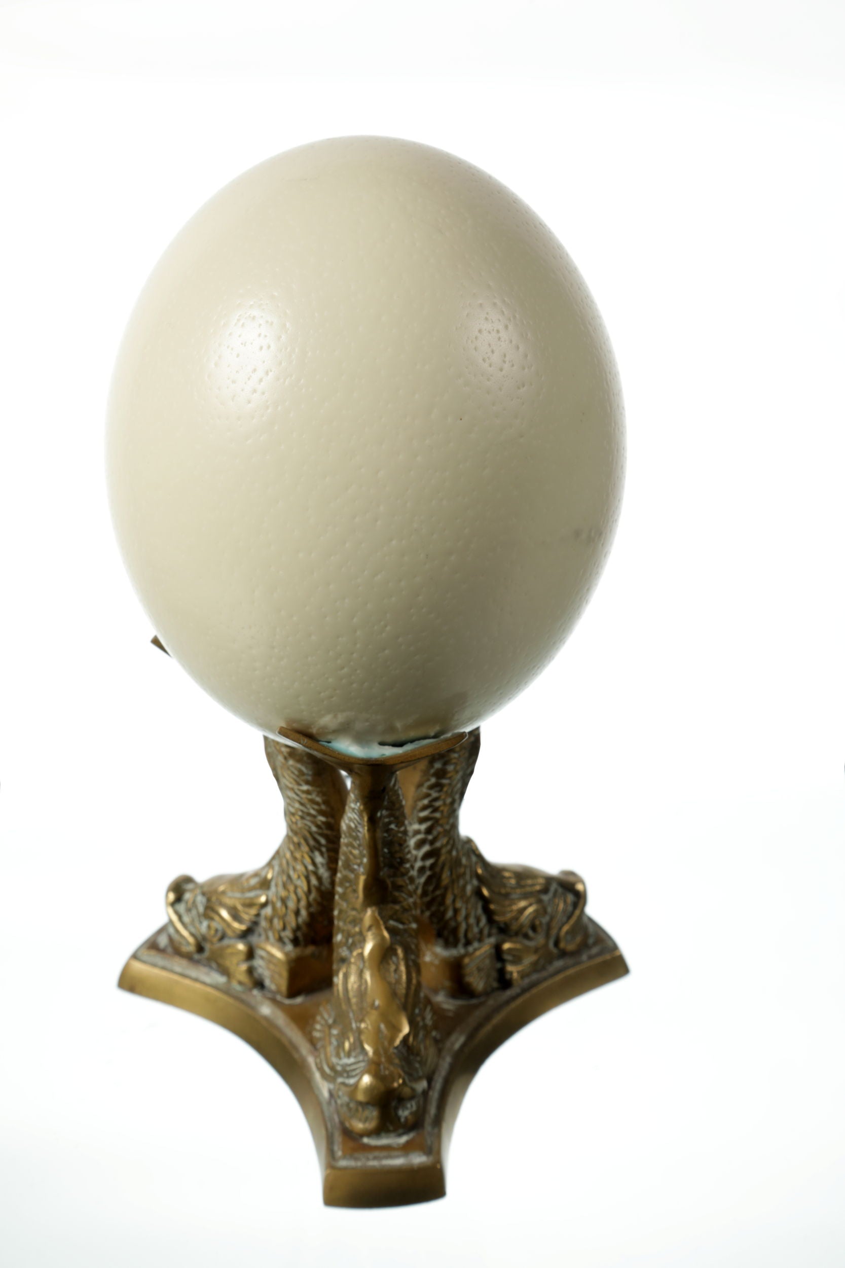 Egg centerpiece with brass base