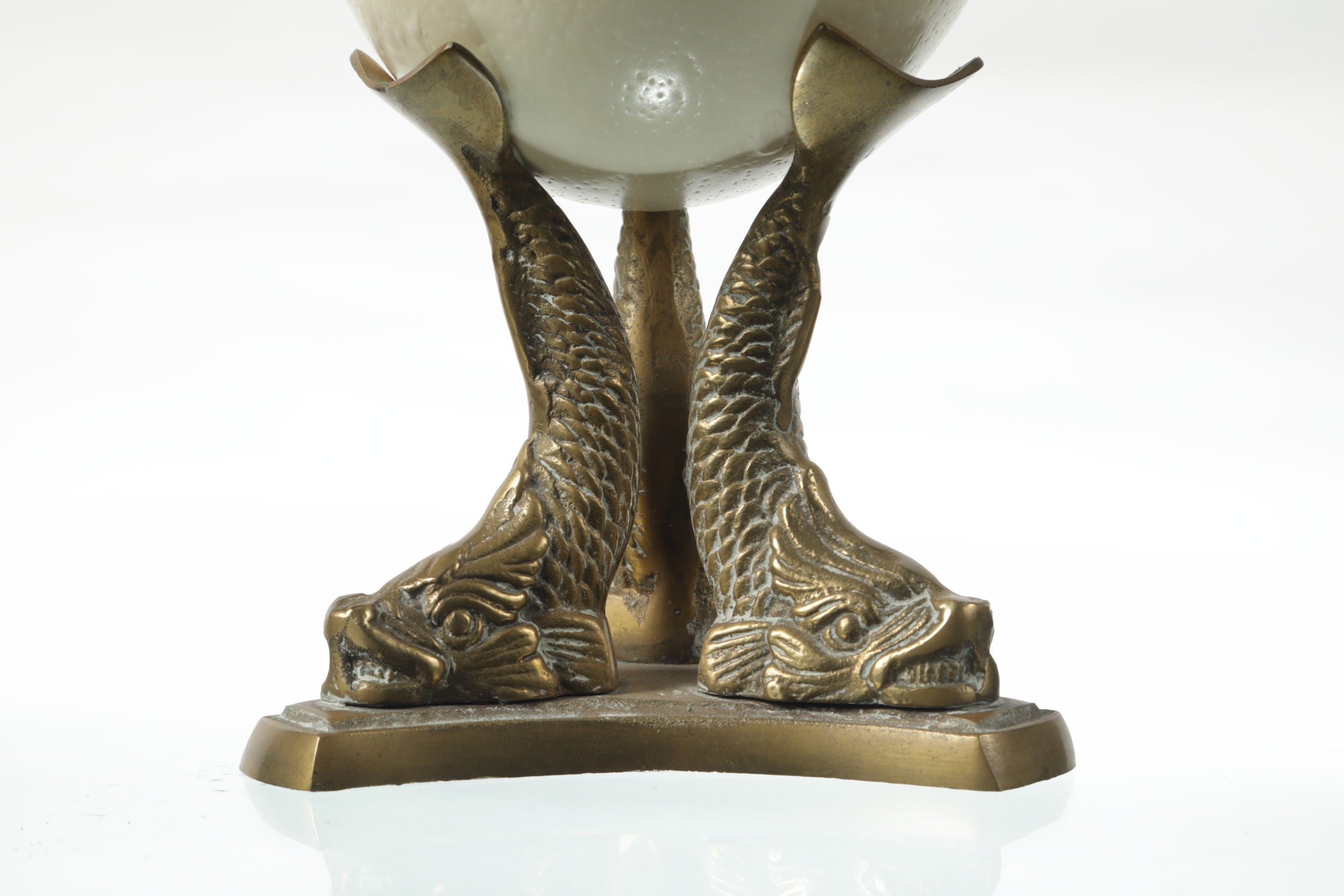 Egg centerpiece with brass base