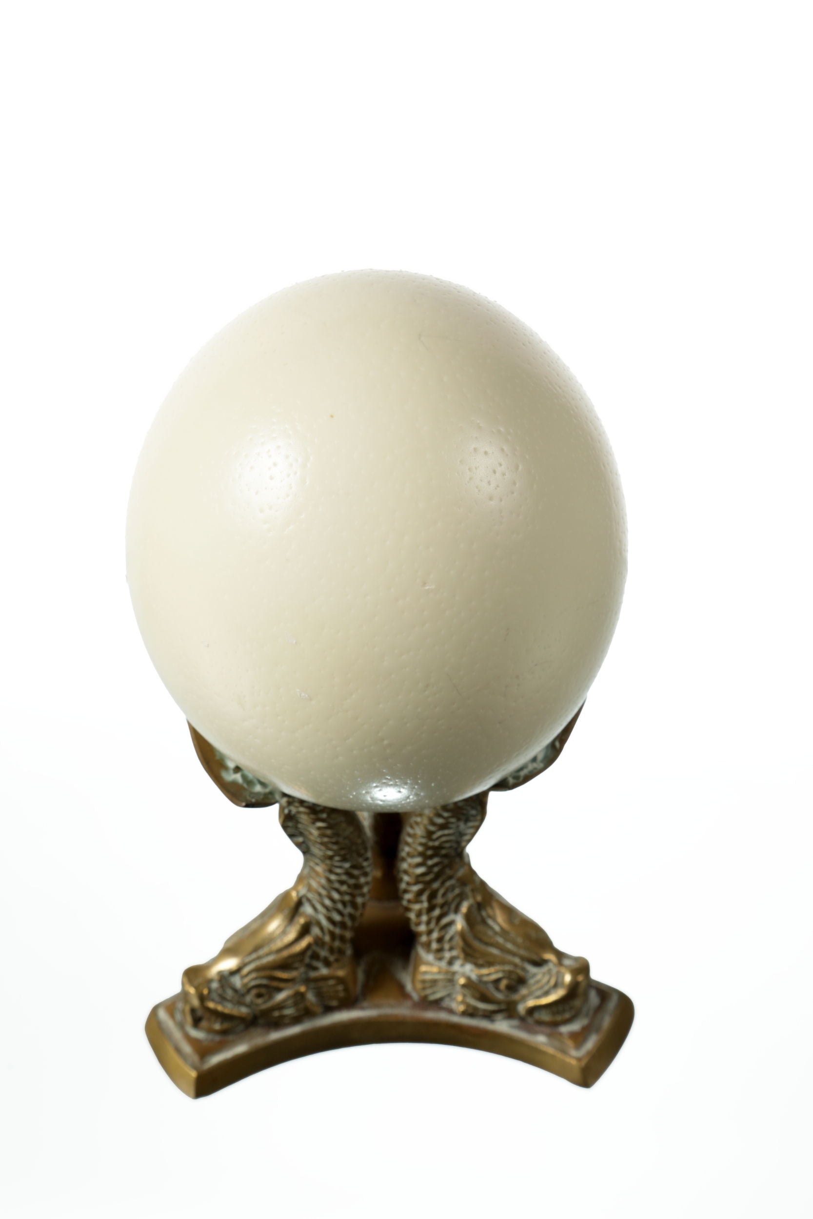 Egg centerpiece with brass base