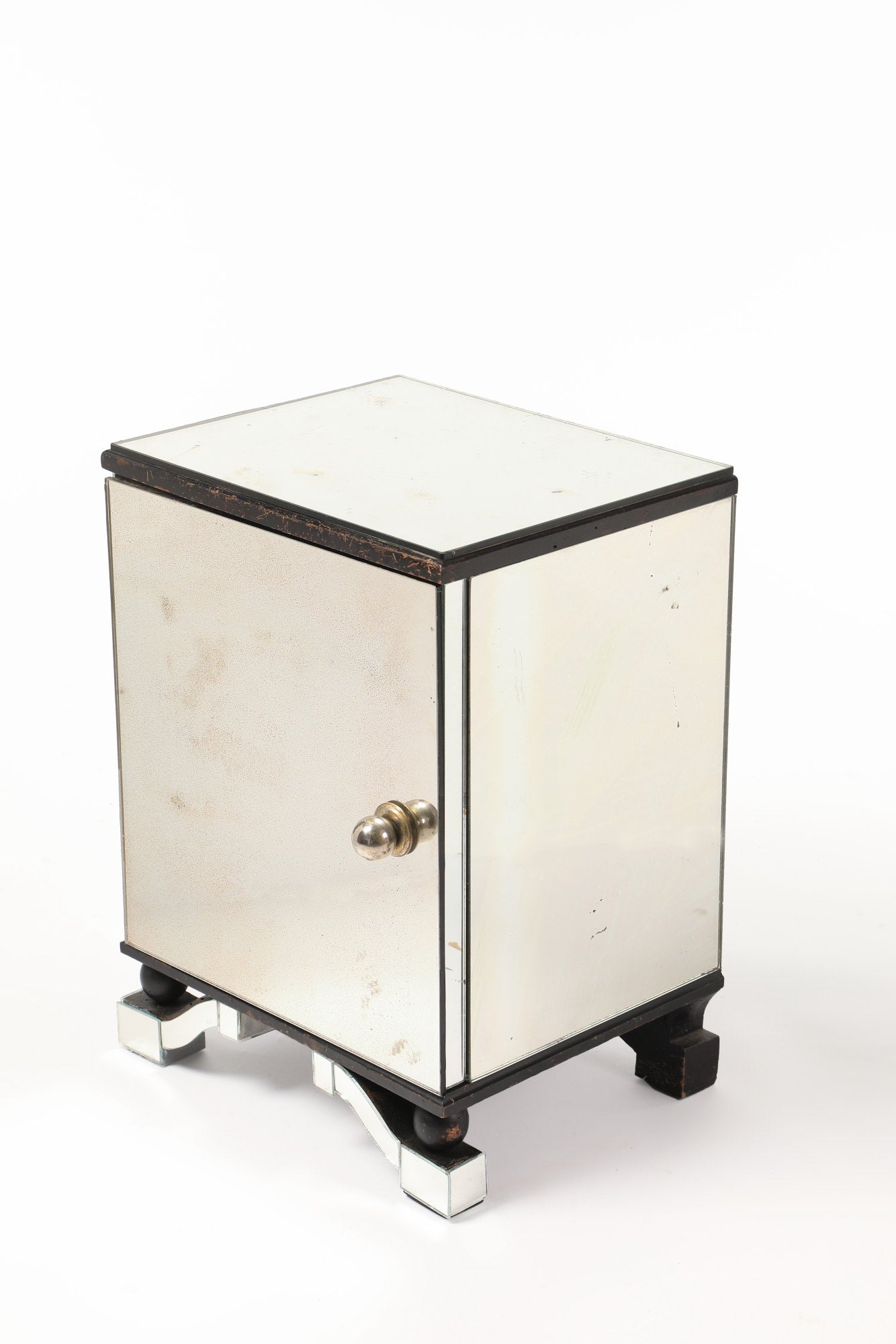 Deco bedside table
covered with mirror