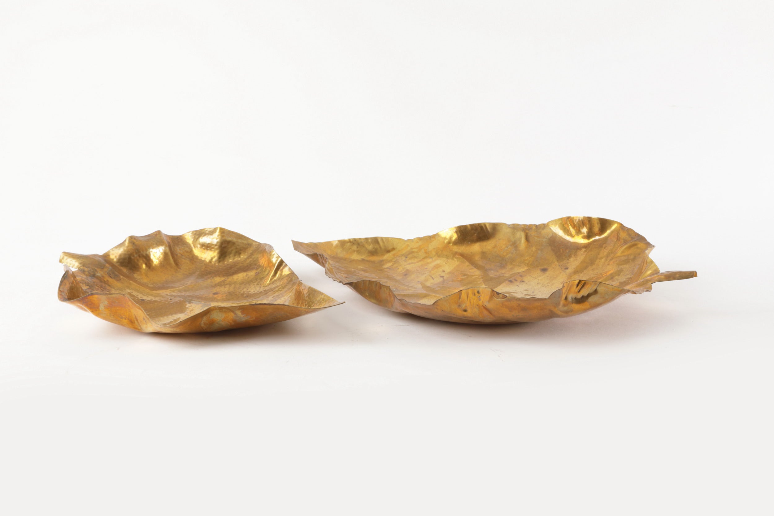 Pair of hand-hammered brass leaf centerpieces from the 1970s