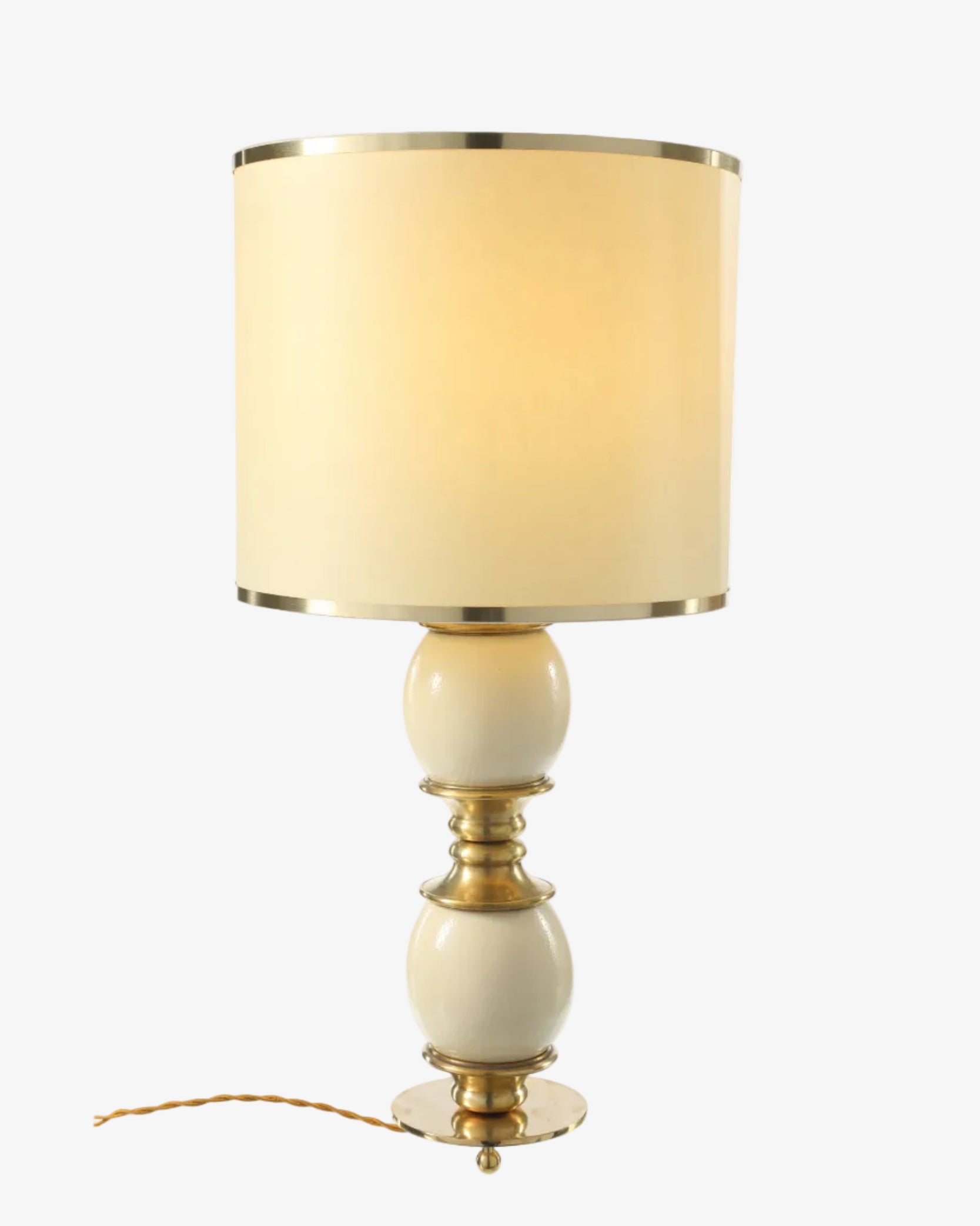 Ostrich egg and brass lamp