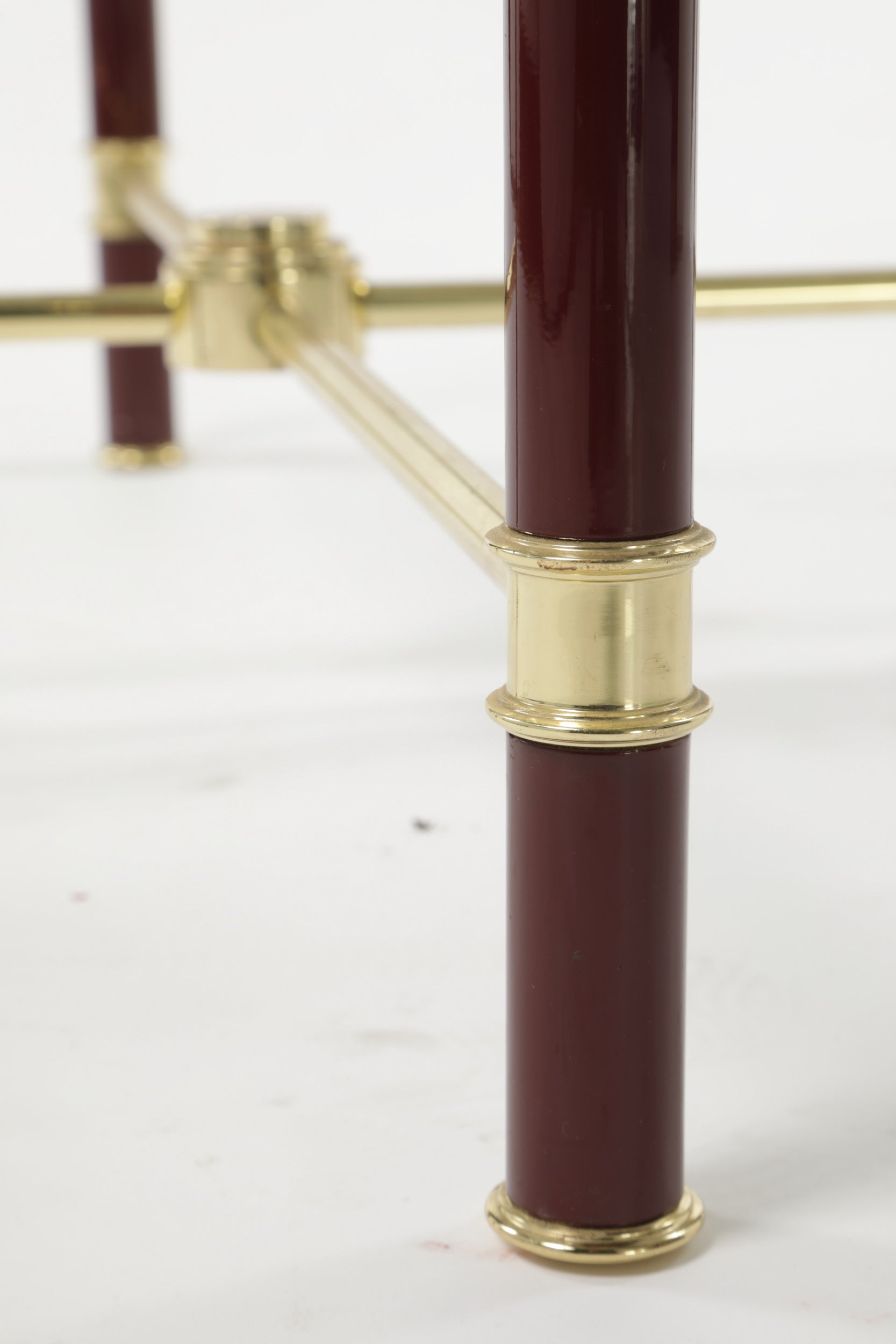 Pair of square burgundy lacquered tables from the 70s