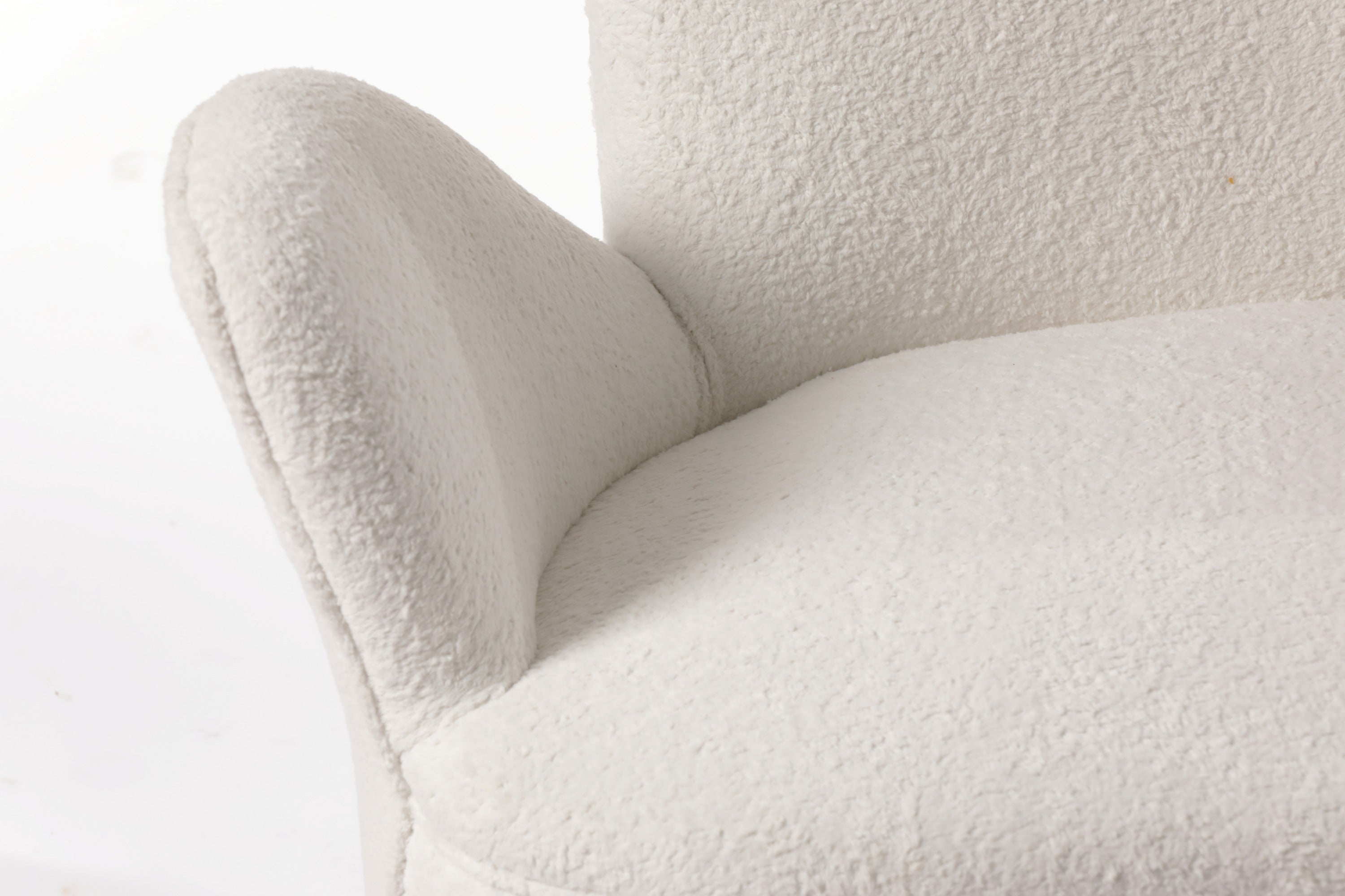 Two-seater bouclé sofa from the 60s