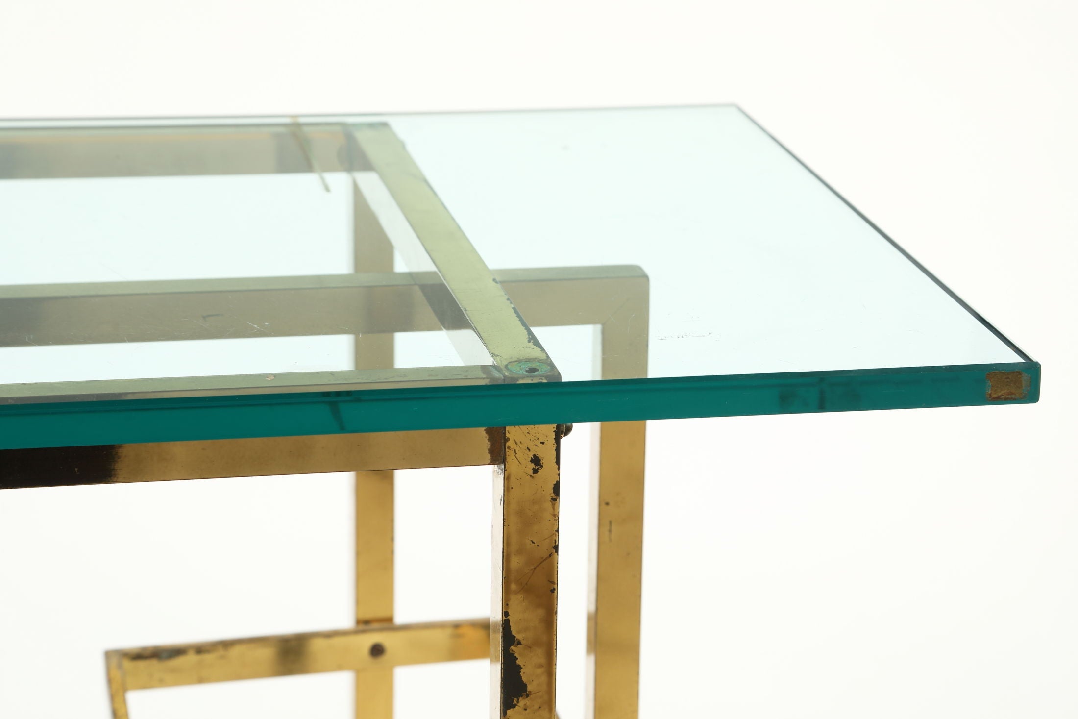 Console from the 70s with brass structure and glass tops