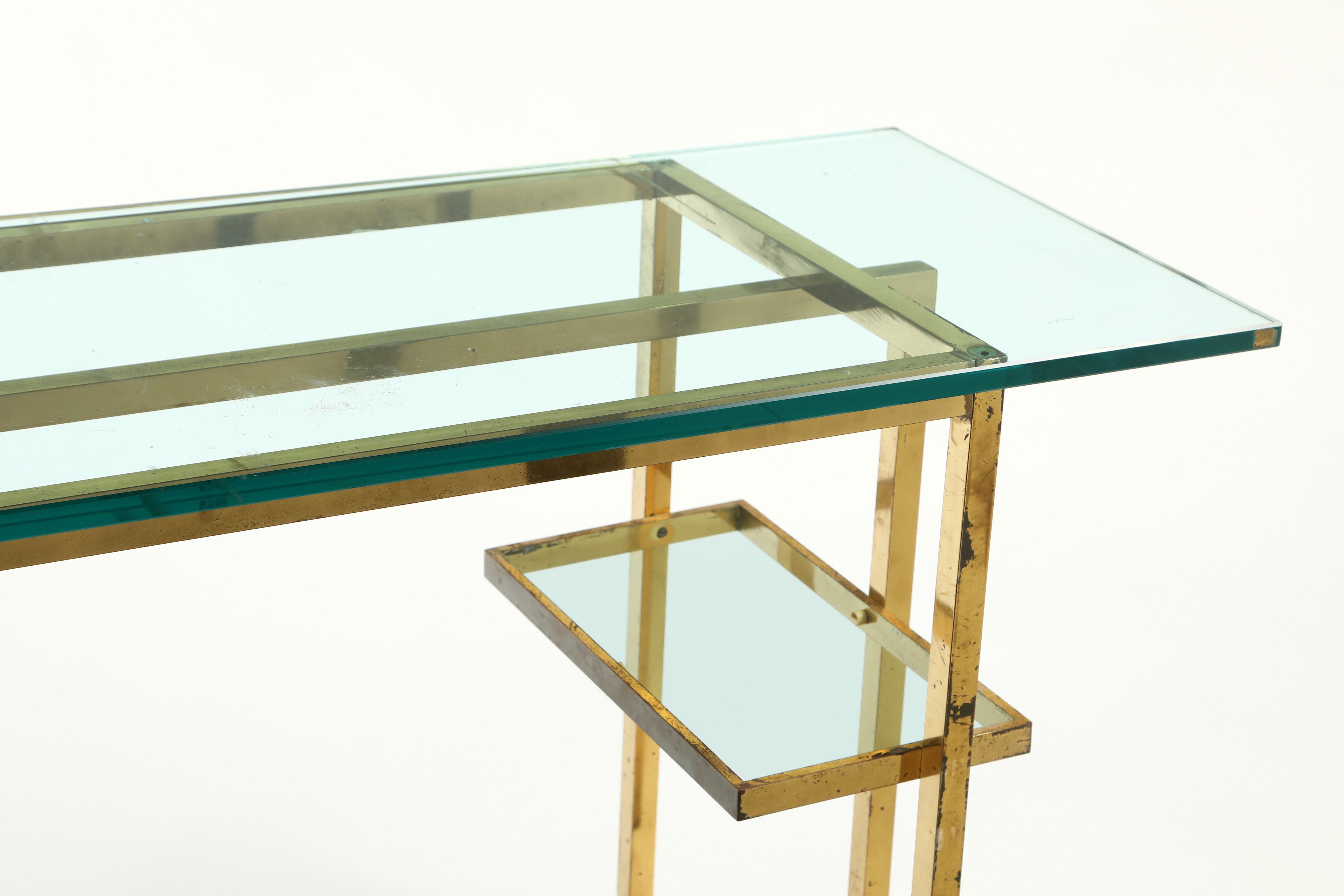 Console from the 70s with brass structure and glass tops