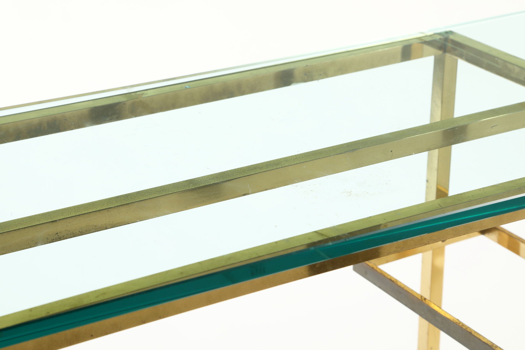 Console from the 70s with brass structure and glass tops