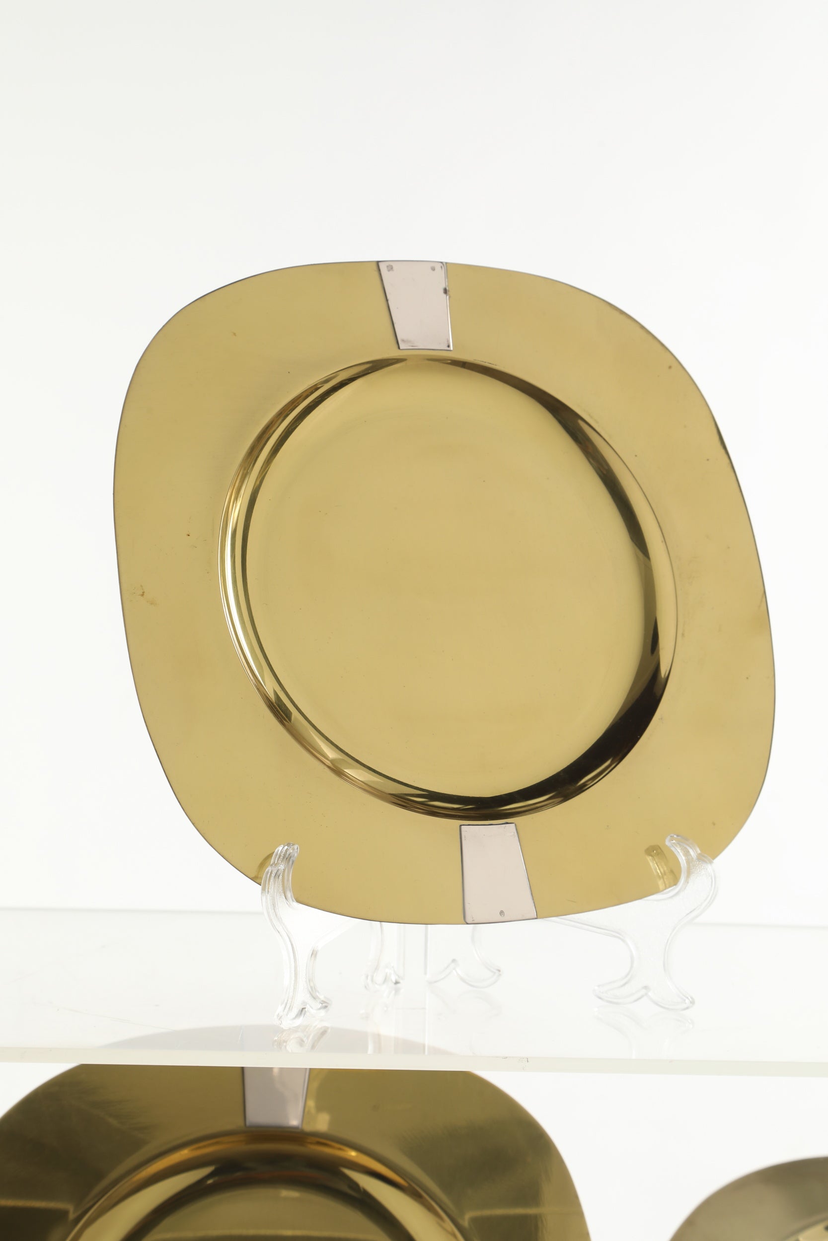 Sip brass and silver charger set