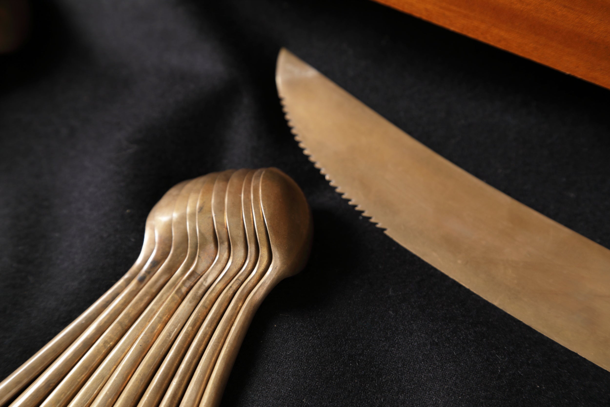Brass cutlery set from the 50s