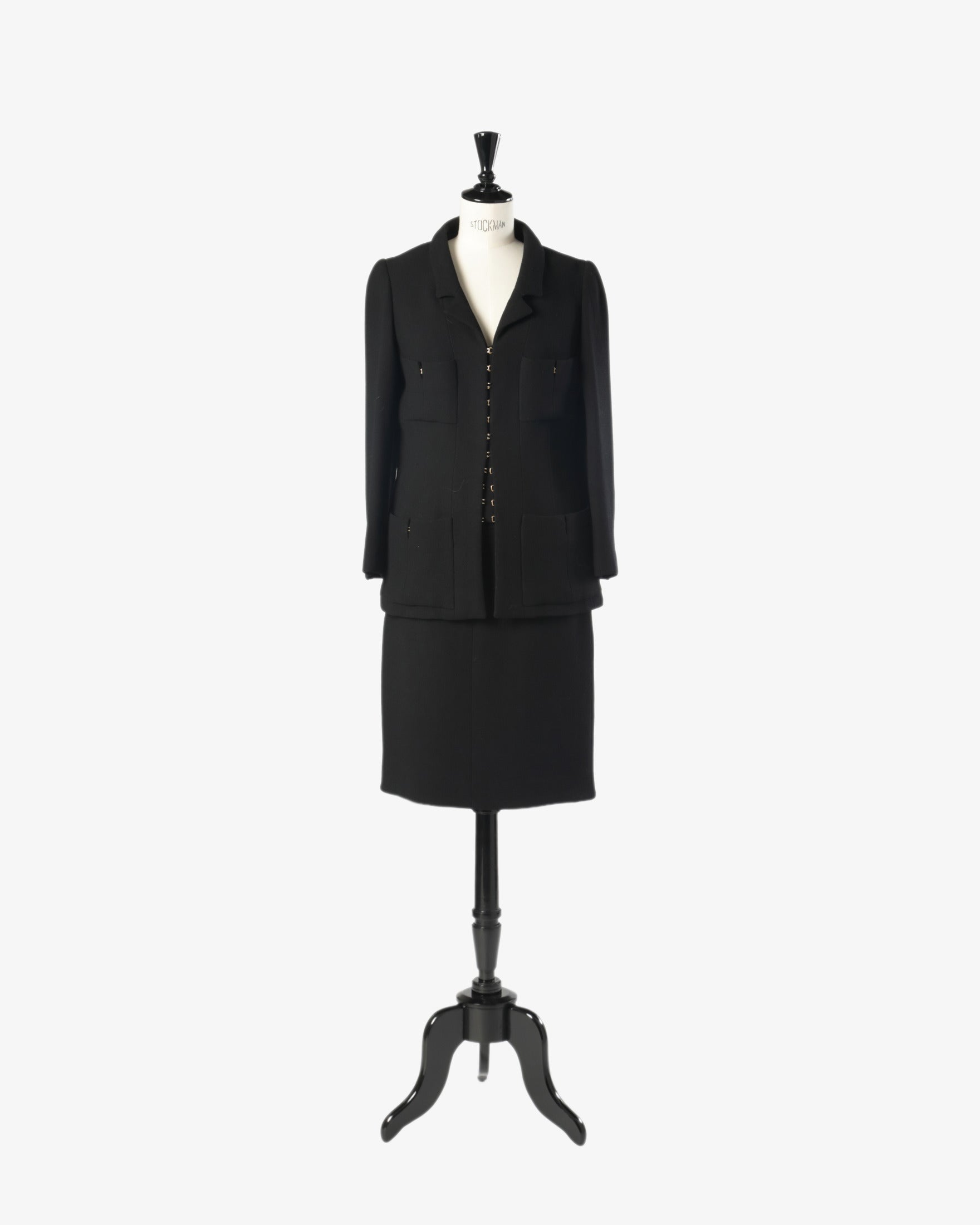 Black Chanel suit from the 90s