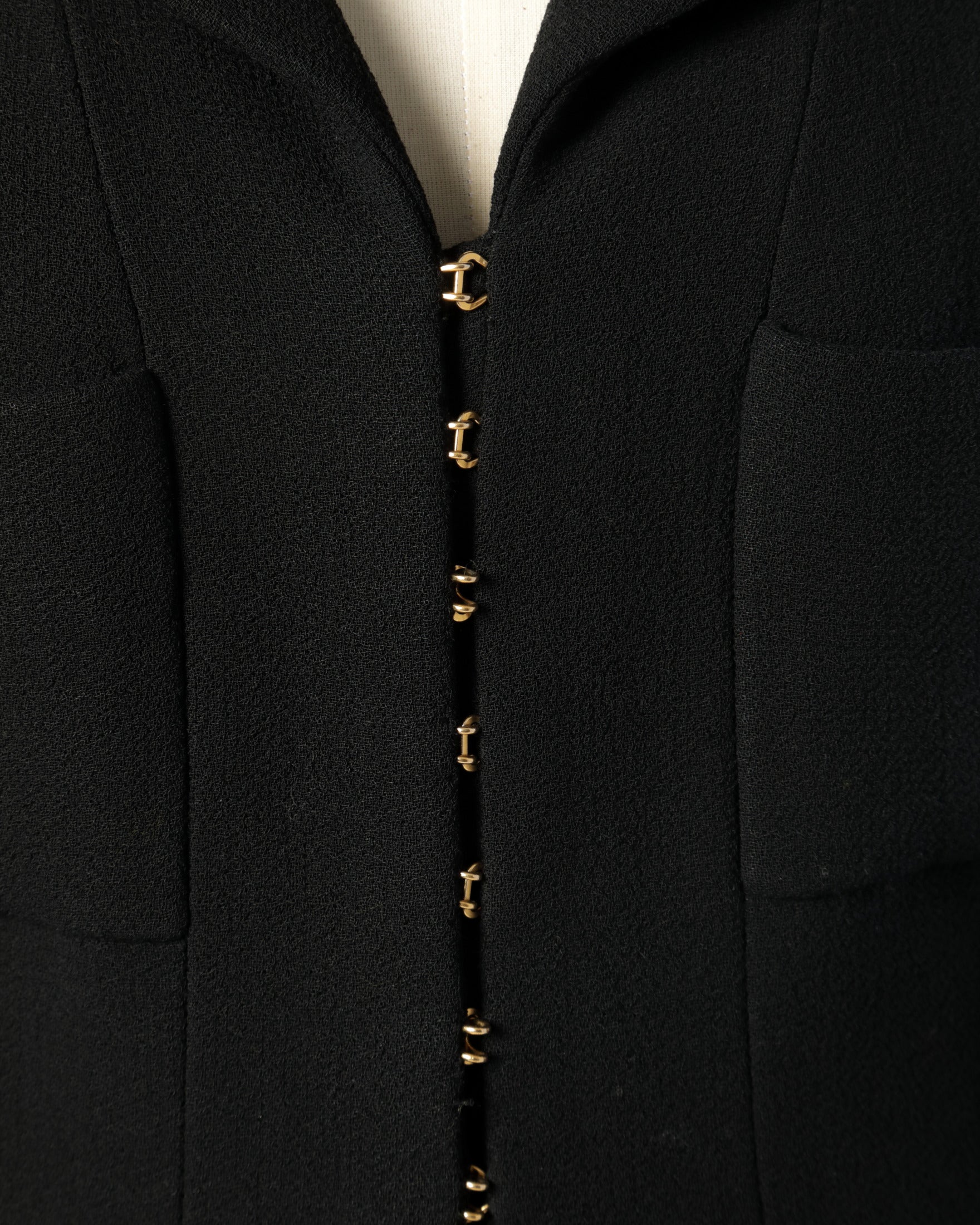 Black Chanel suit from the 90s
