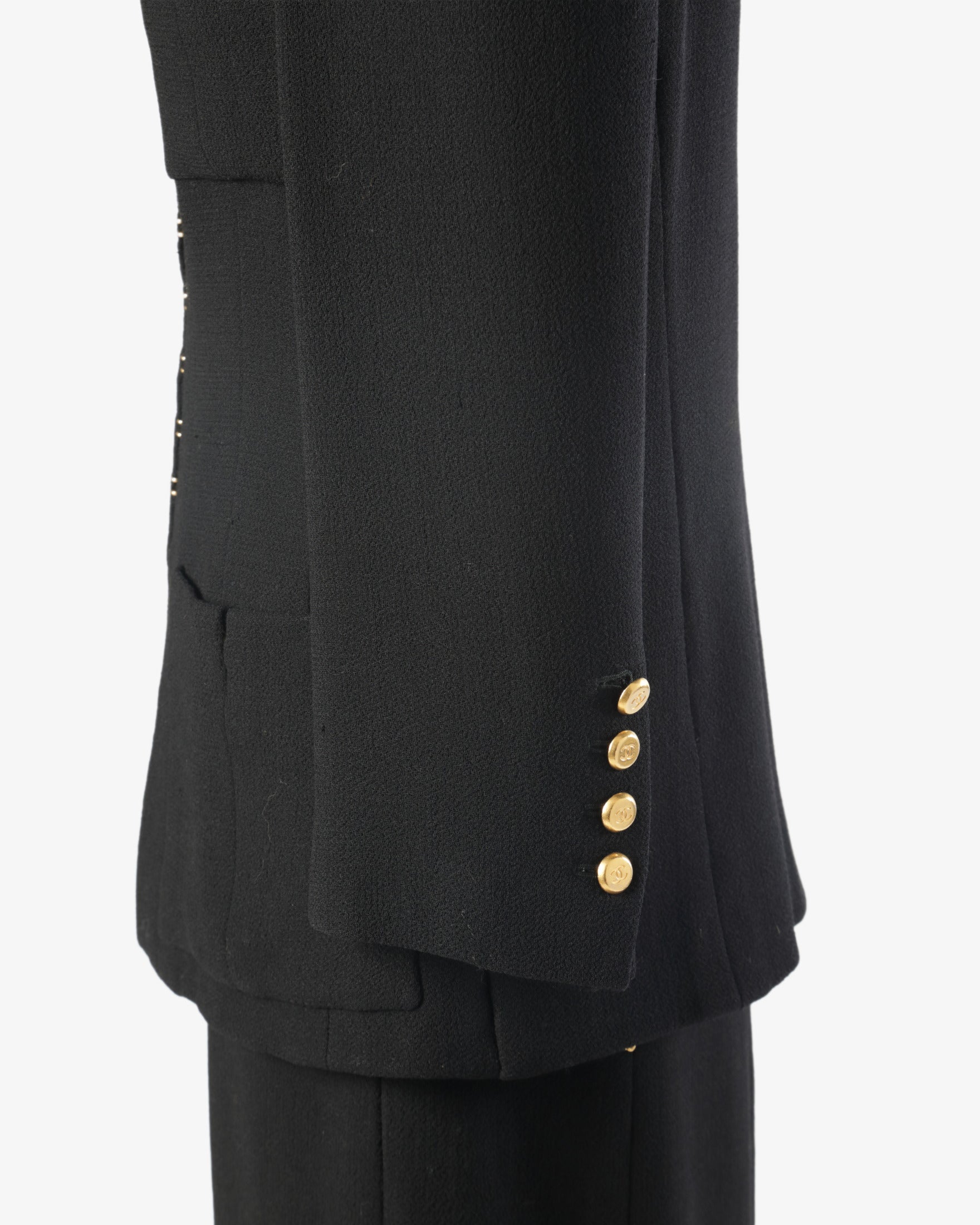 Black Chanel suit from the 90s