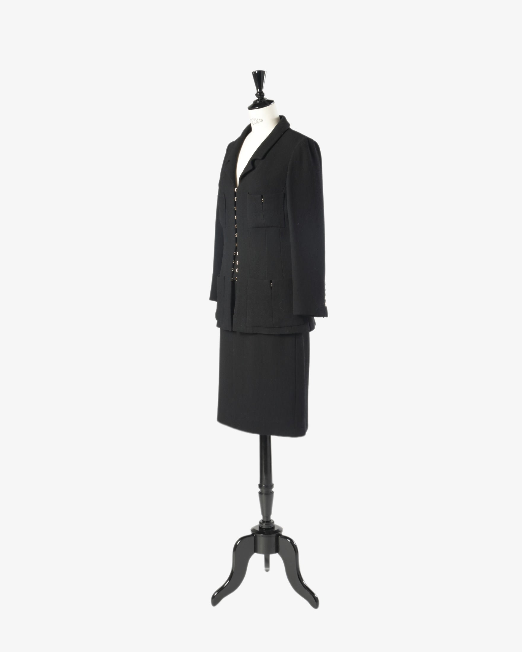 Black Chanel suit from the 90s