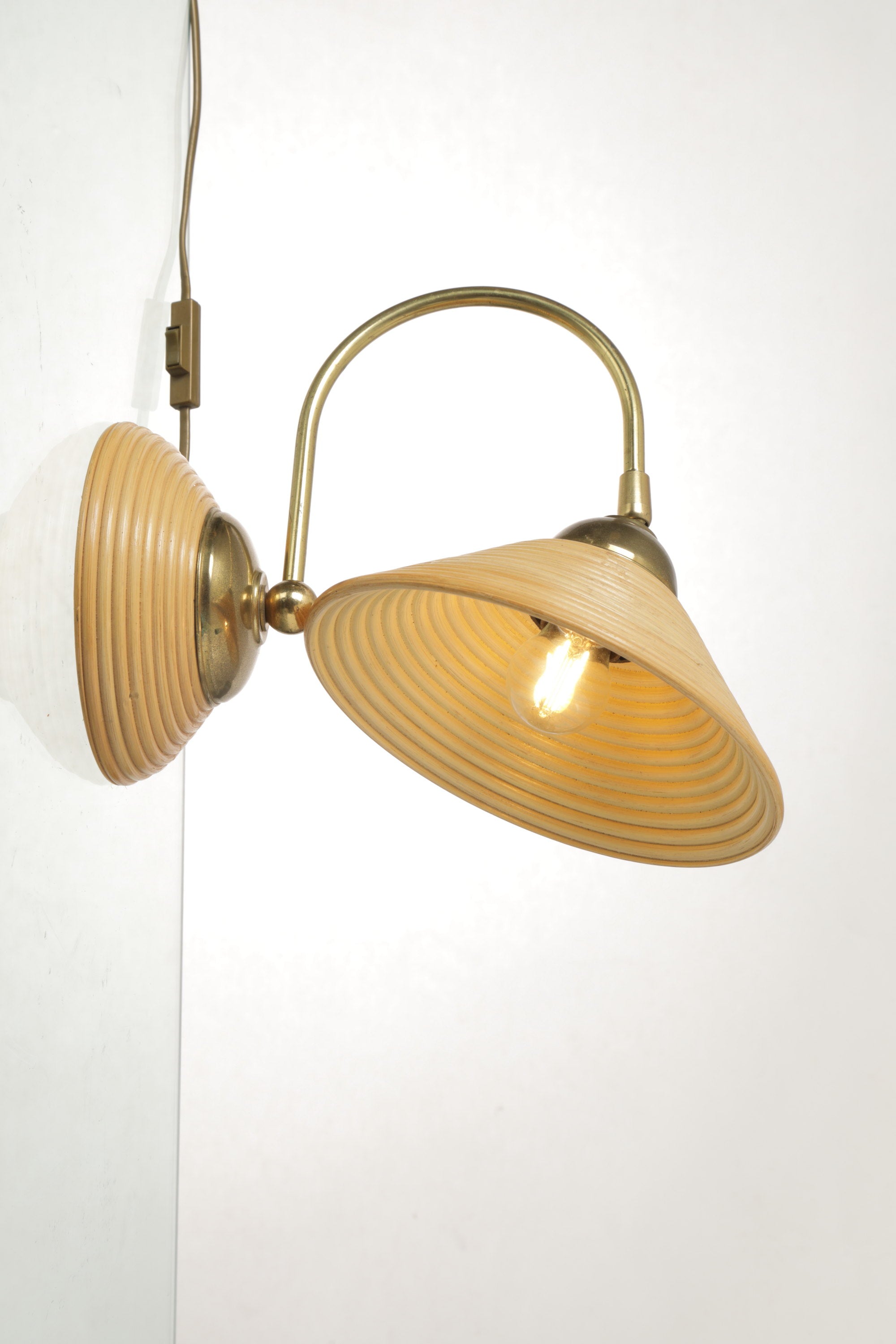 70s rattan and brass wall lamp