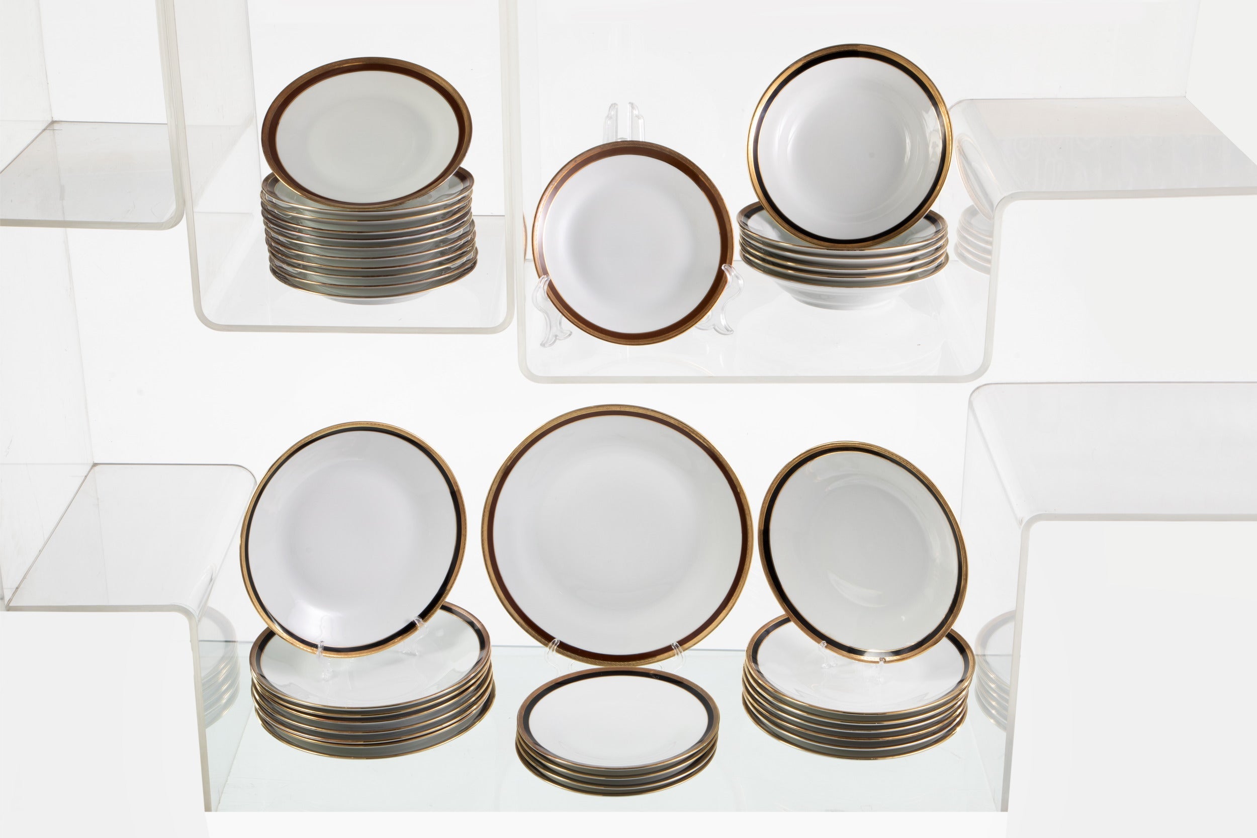 Ginori dinner set with black and gold edge