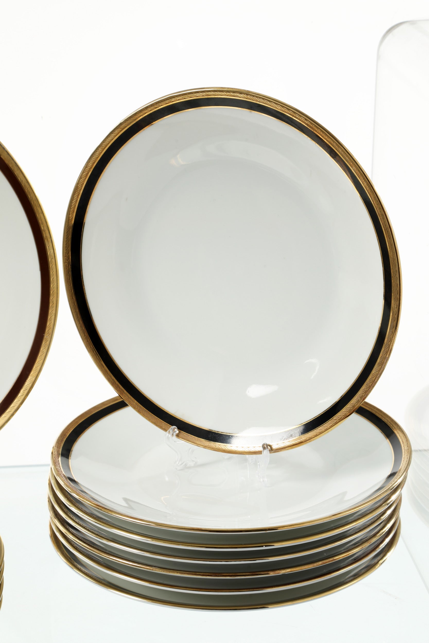 Ginori dinner set with black and gold edge