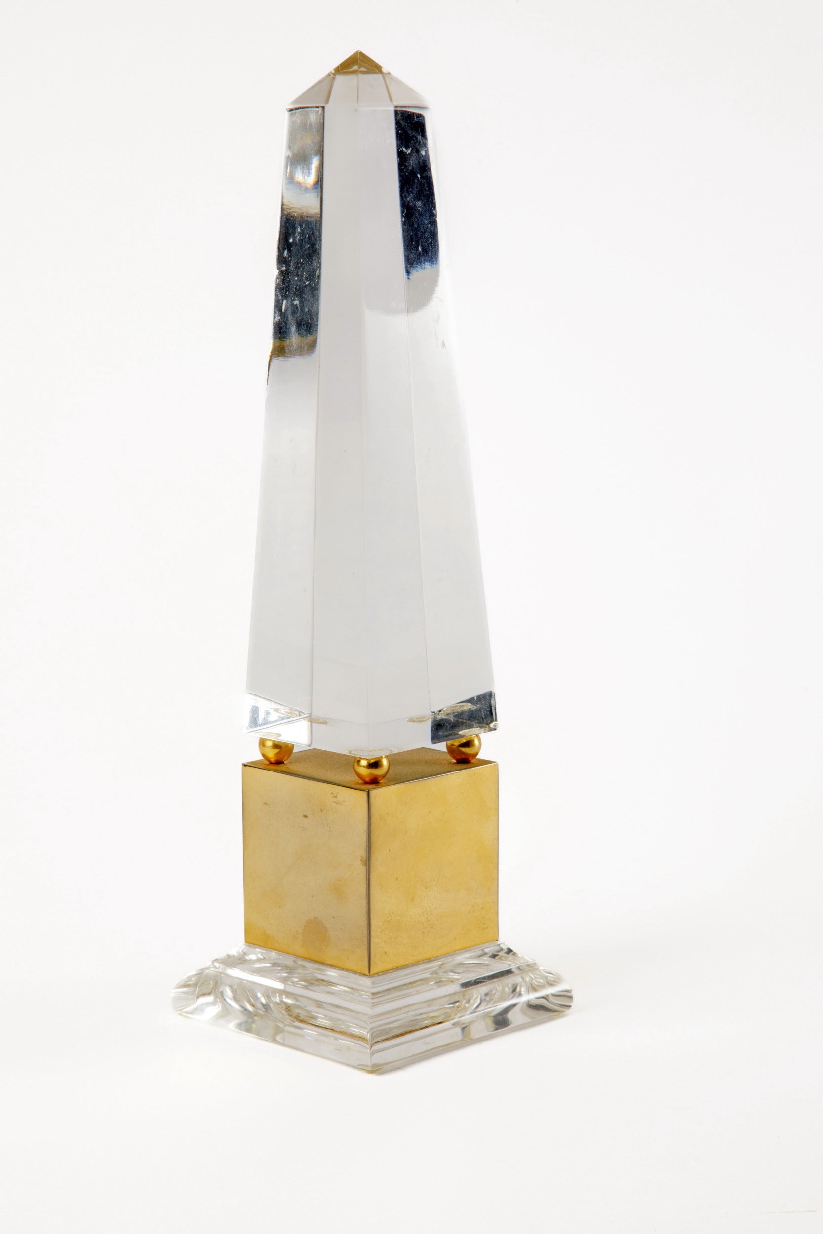 Plexiglass and brass obelisk from the 1970s