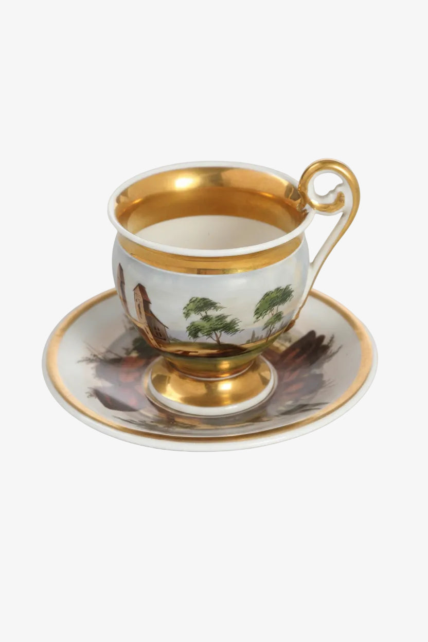 Small hand-painted porcelain cup from the 1800s