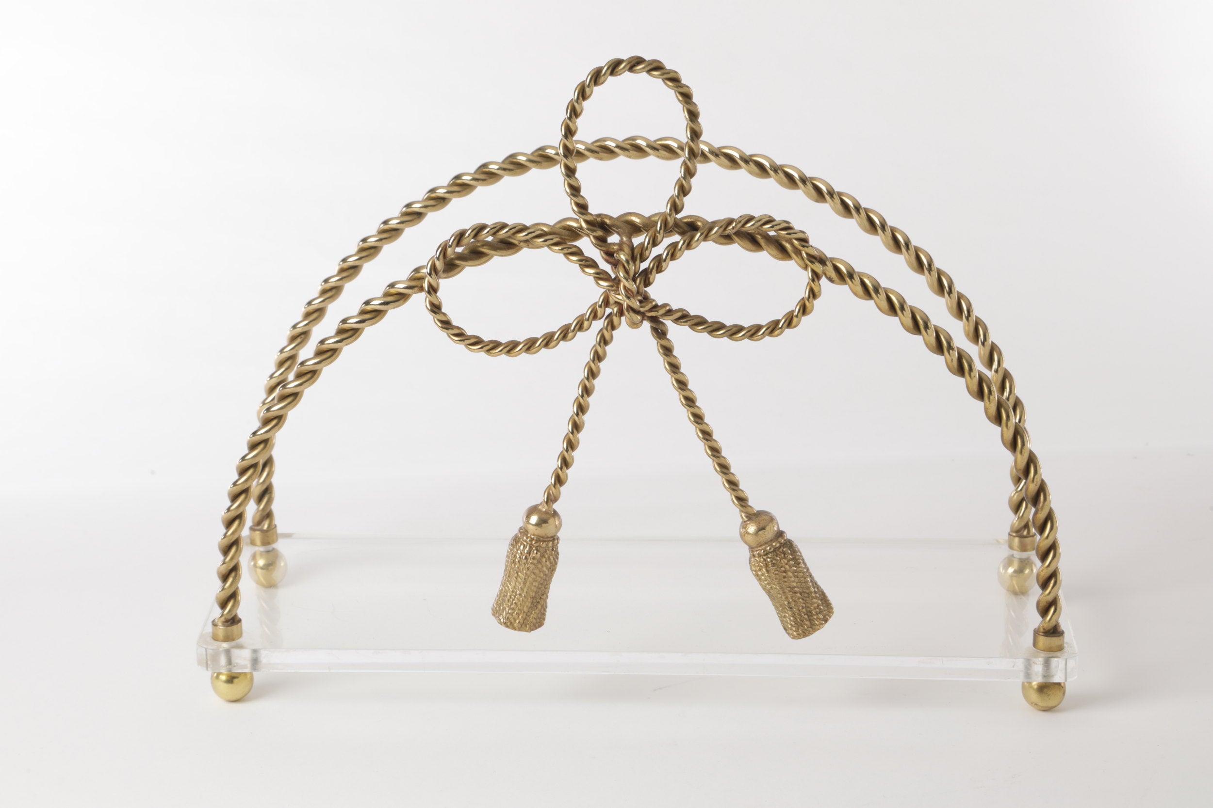 Brass and plexiglass magazine rack from the 70s