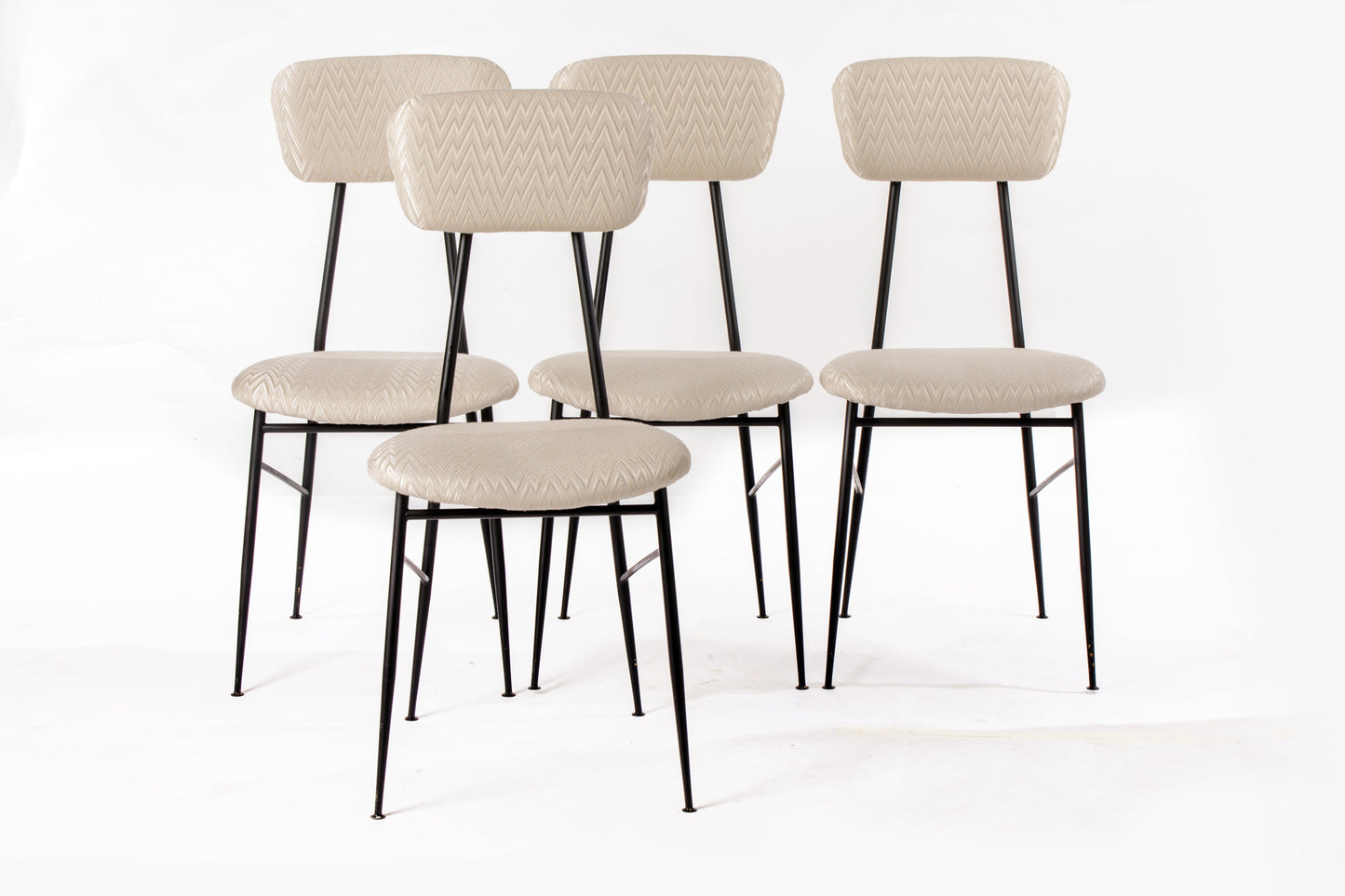 Six ivory herringbone fabric chairs reinterpreted by triplef
