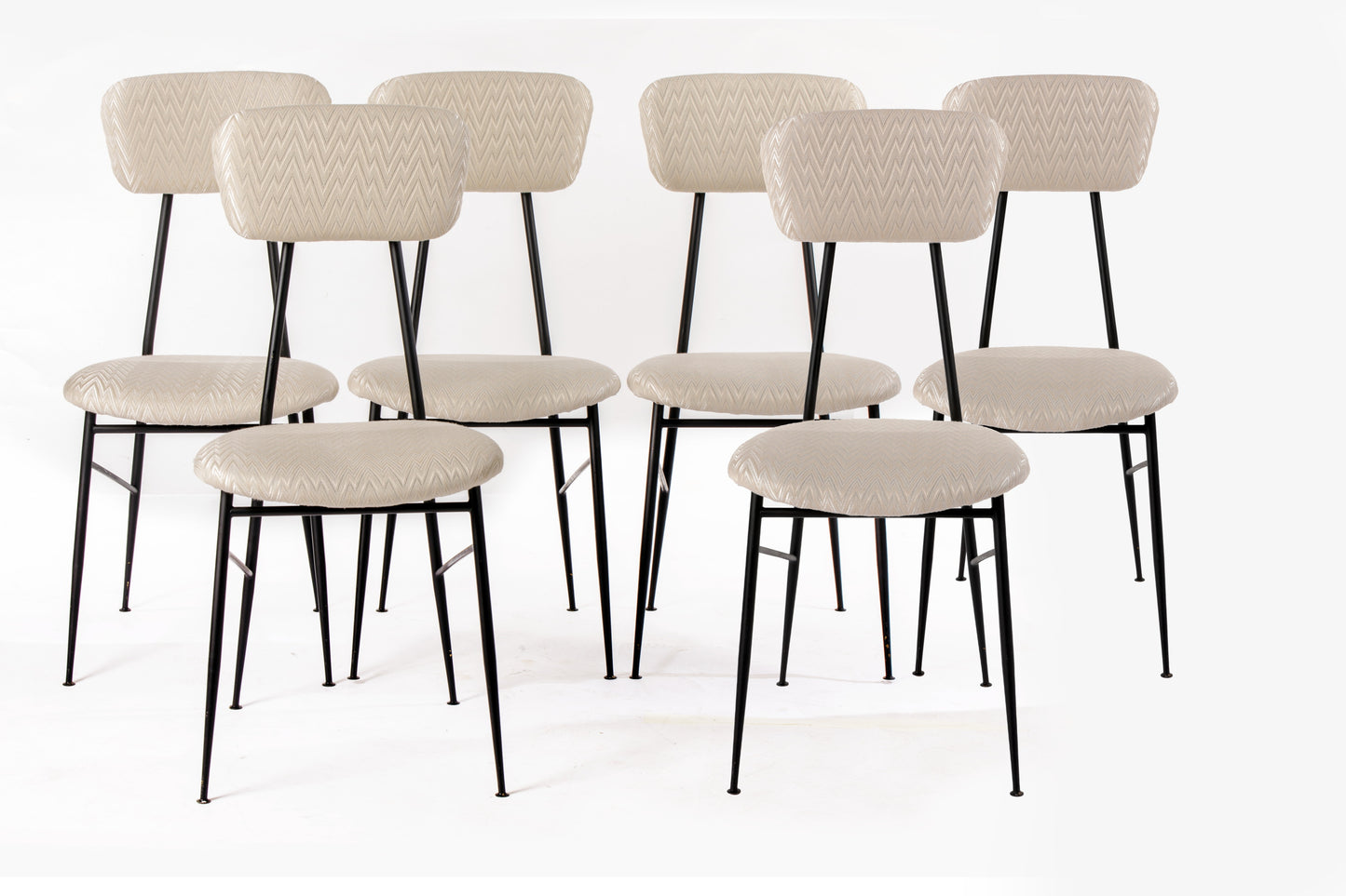 Six ivory herringbone fabric chairs reinterpreted by triplef
