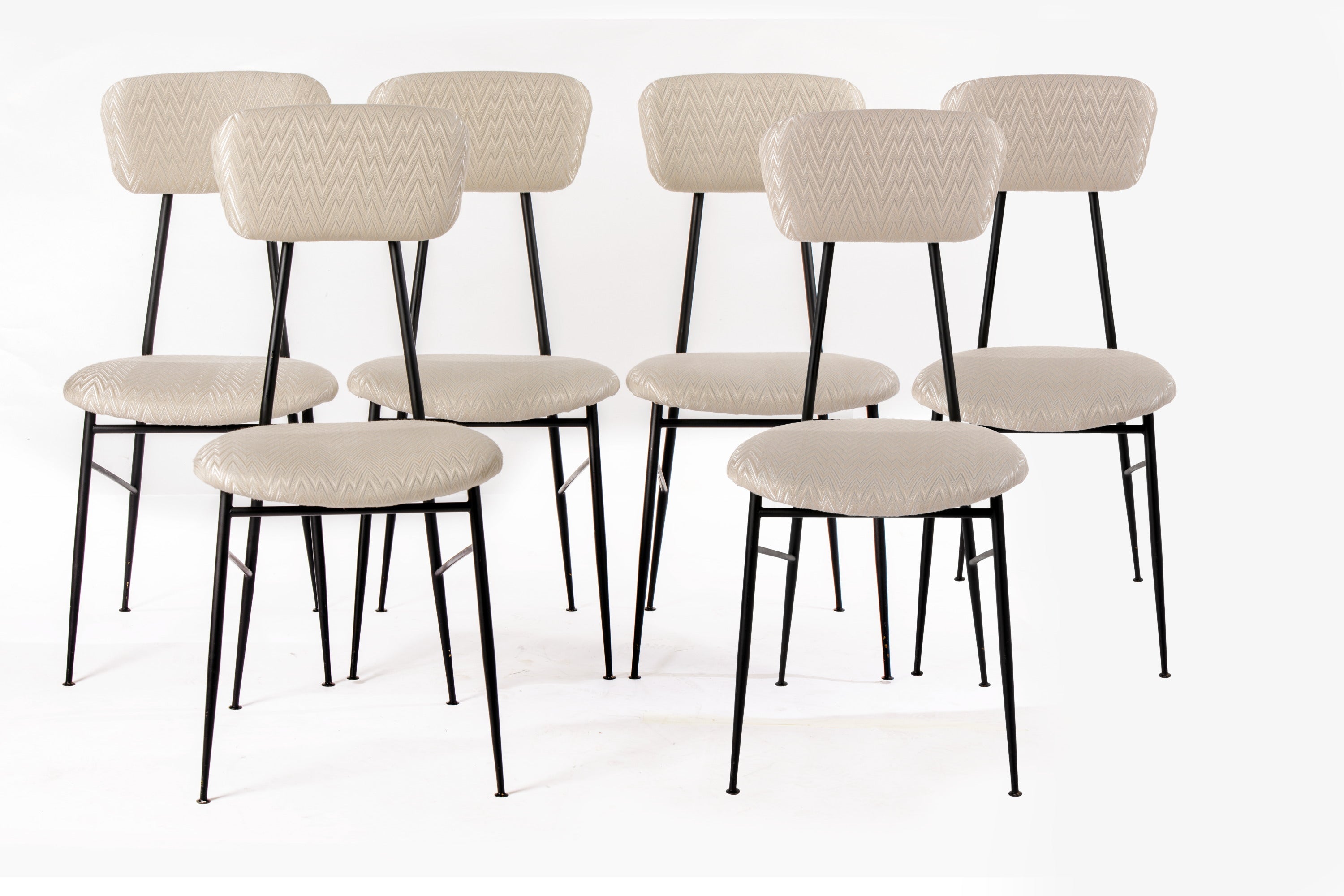 Six ivory herringbone fabric chairs reinterpreted by triplef