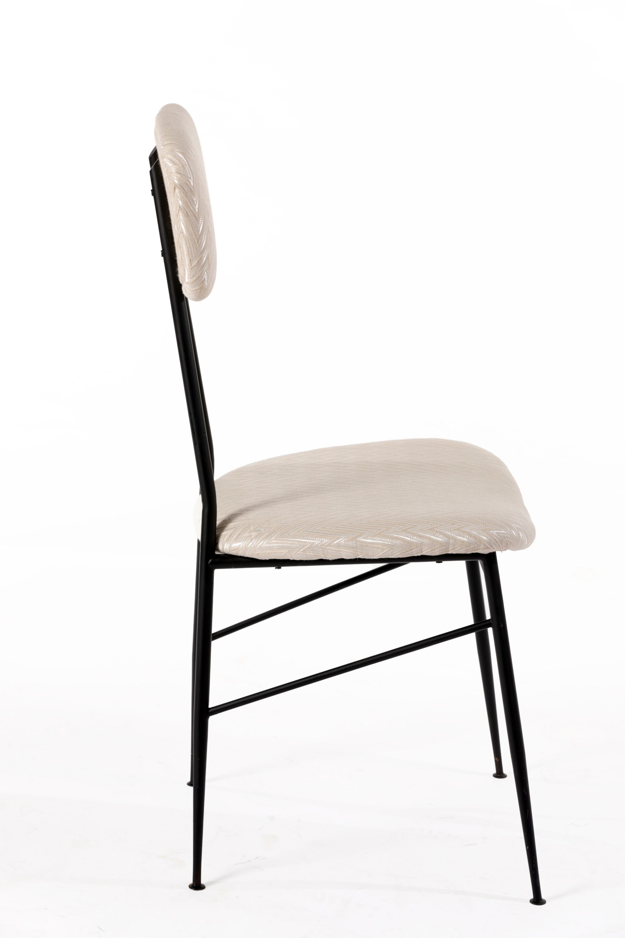 Six ivory herringbone fabric chairs reinterpreted by triplef