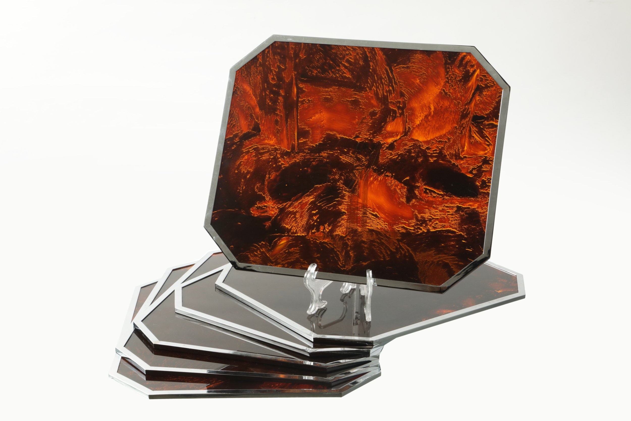 Six 1970s placemats in steel and lucite