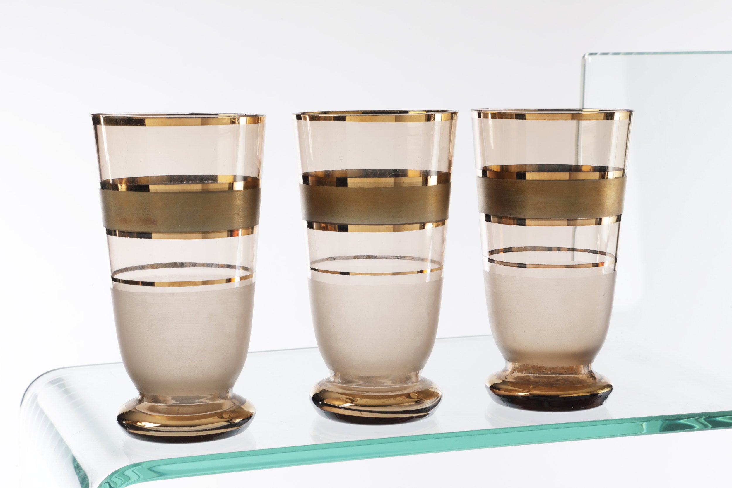 Pitcher set with six smoked glass glasses