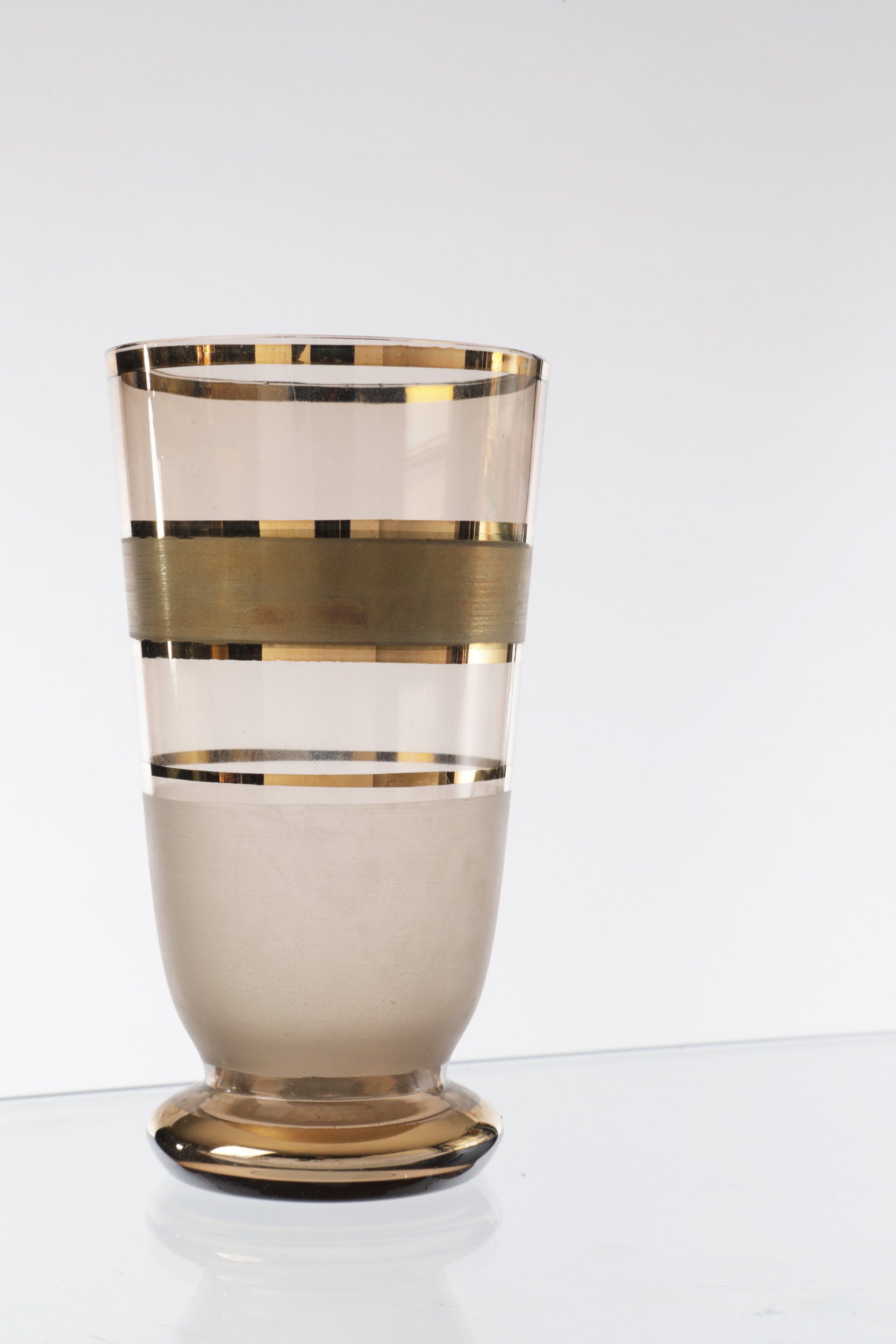 Pitcher set with six smoked glass glasses