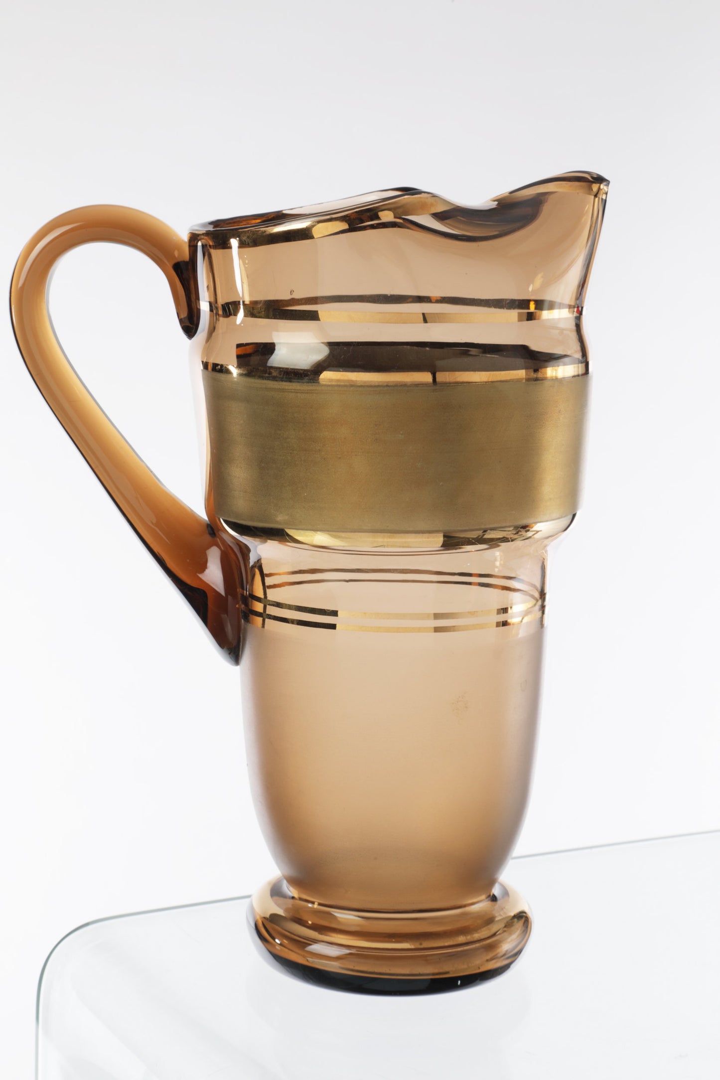 Pitcher set with six smoked glass glasses