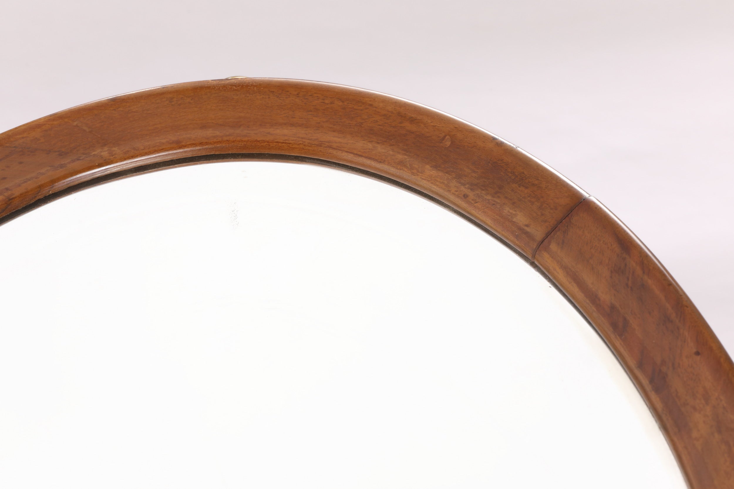 1970s oval teak and brass mirror