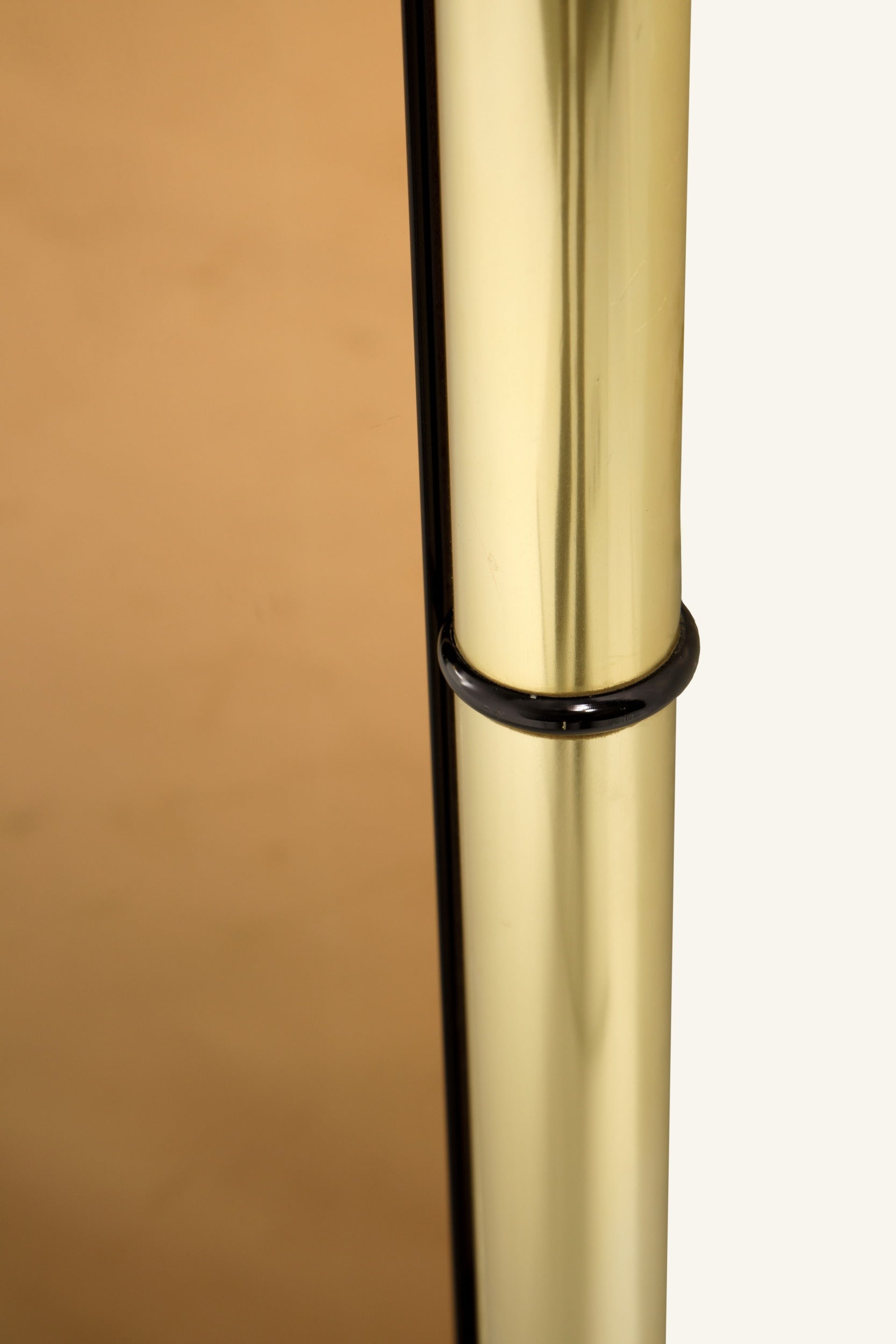1970s bronzed tubular brass mirror