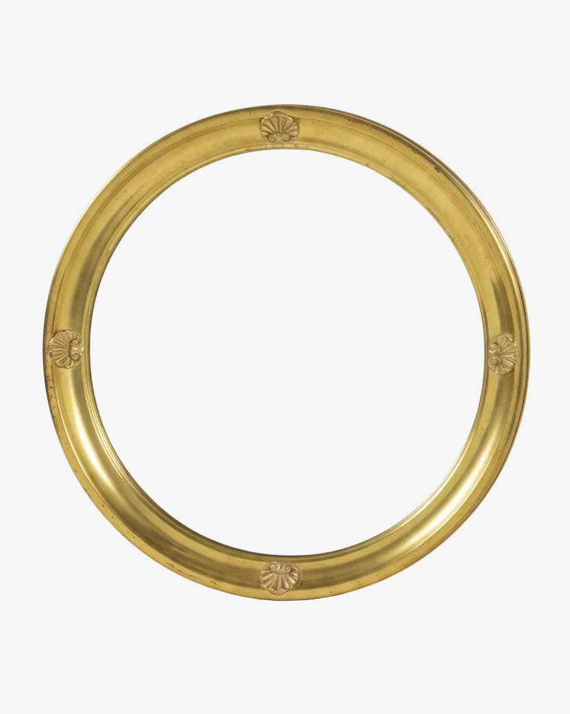 Round beveled mirror from the 1950s with golden shell frame