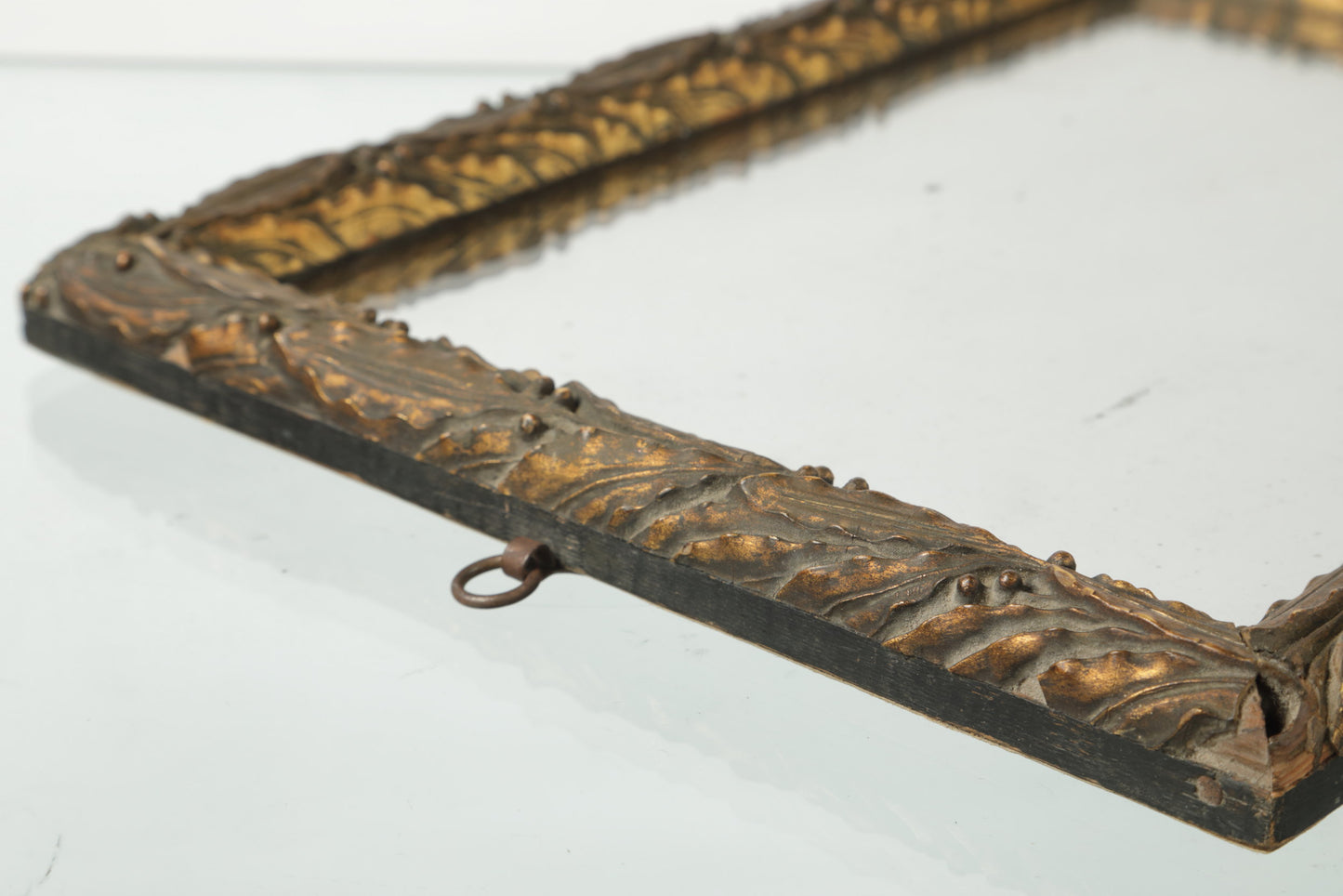 Mirror with golden frame and plaster paste leaves, early 1900s