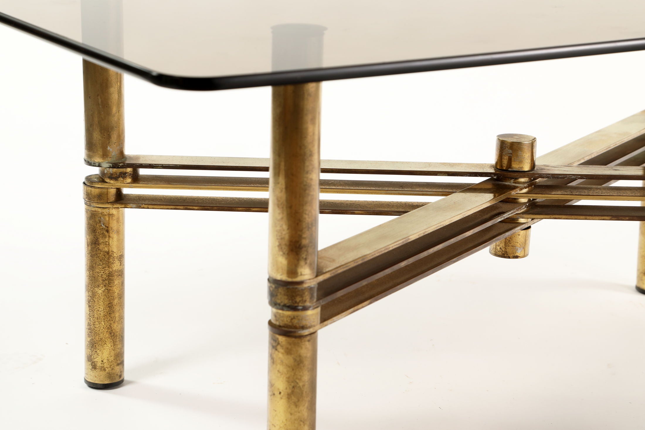 Living room table from the 70s in brass and smoked glass