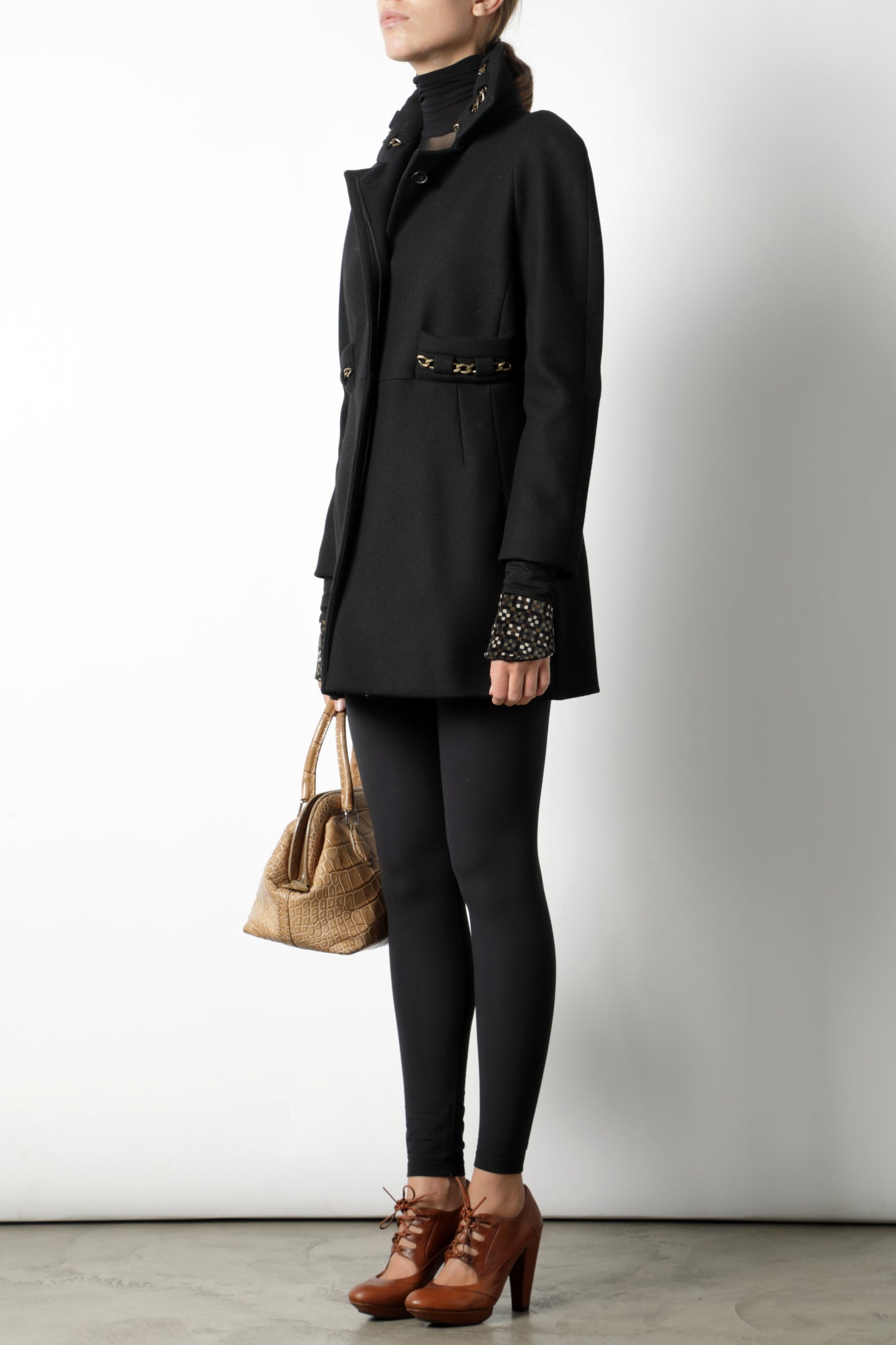 Black Chloe coat with golden chain inserts