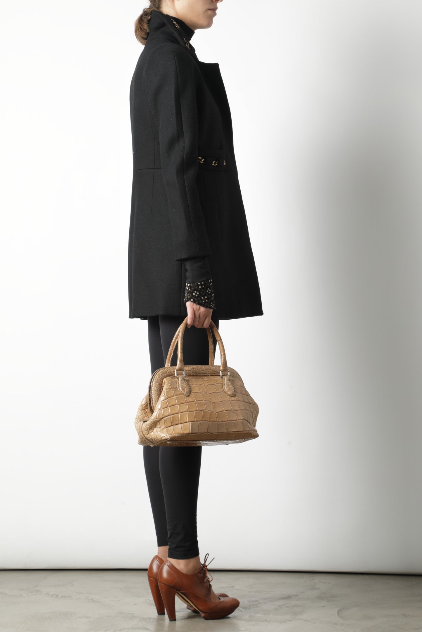 Black Chloe coat with golden chain inserts