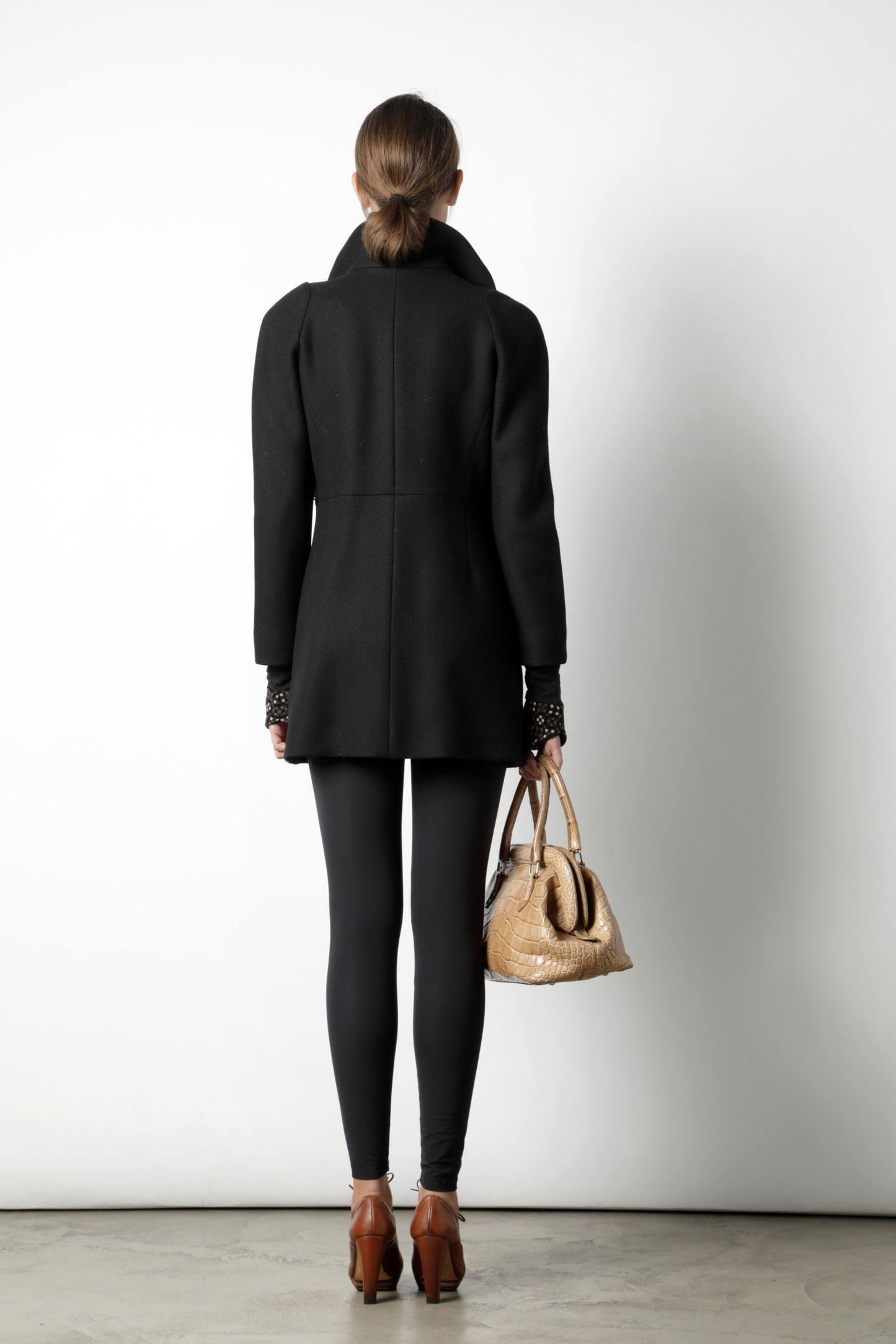 Black Chloe coat with golden chain inserts