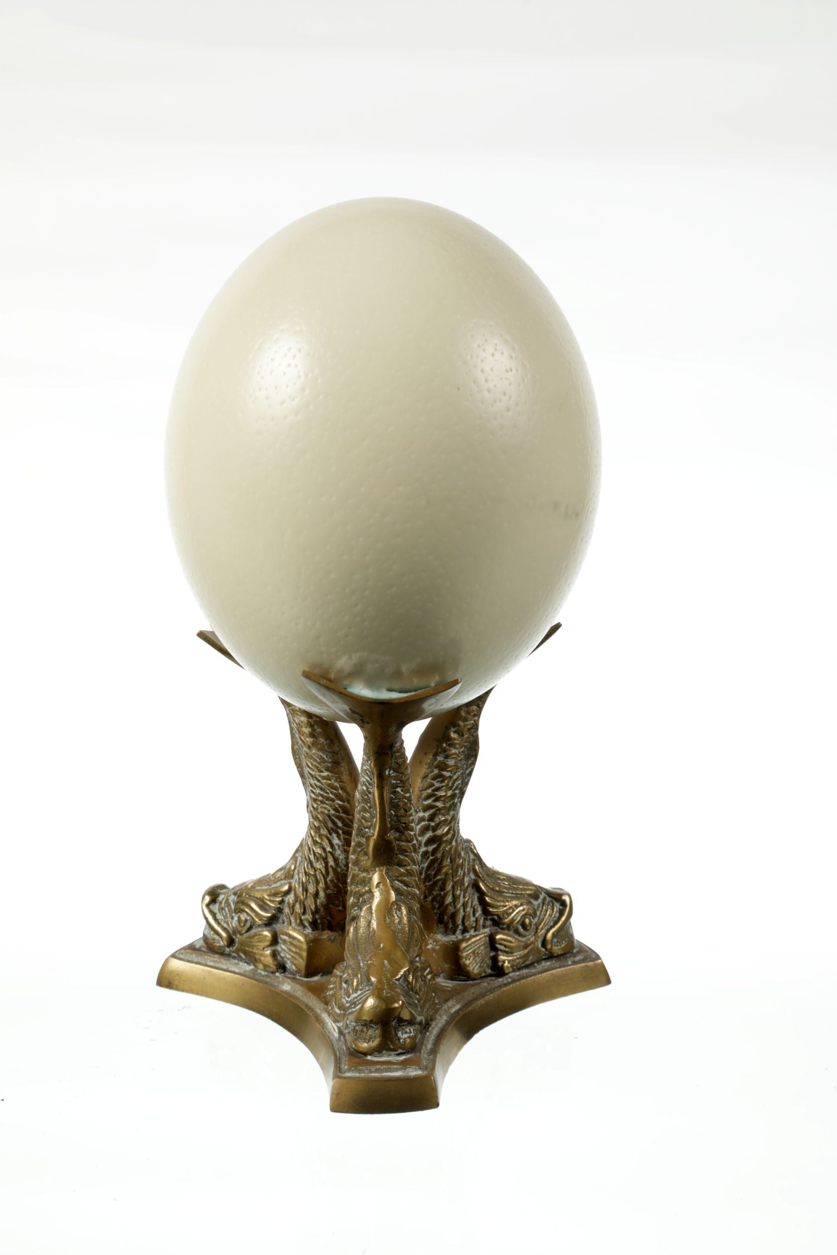 Egg centerpiece with brass base
