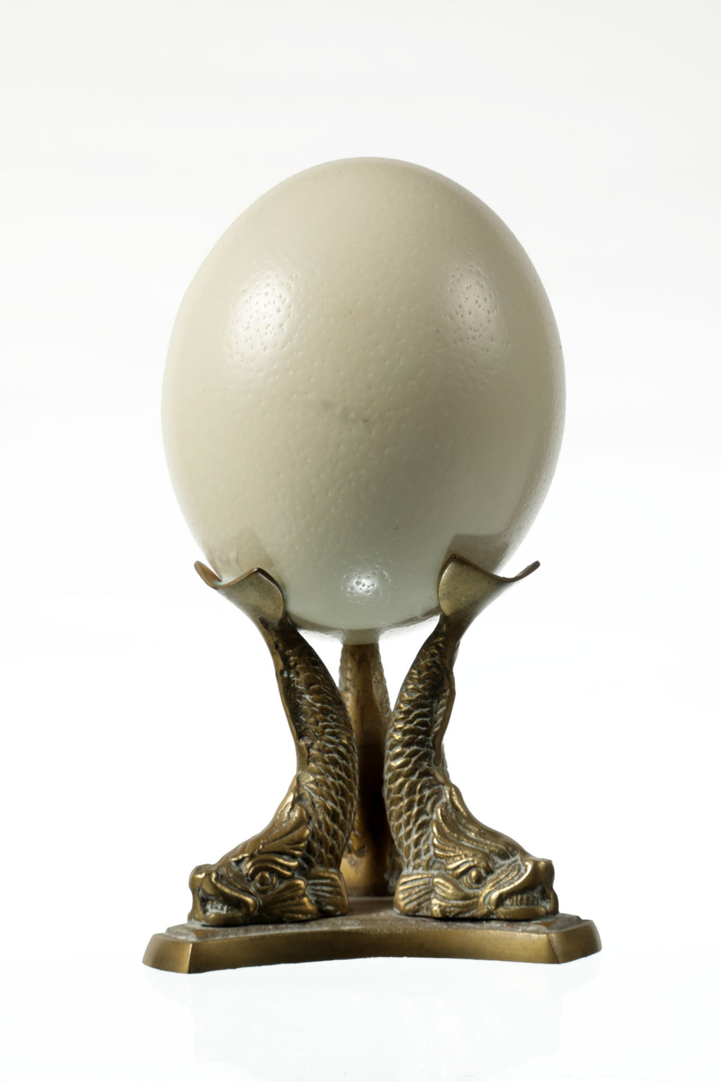 Egg centerpiece with brass base