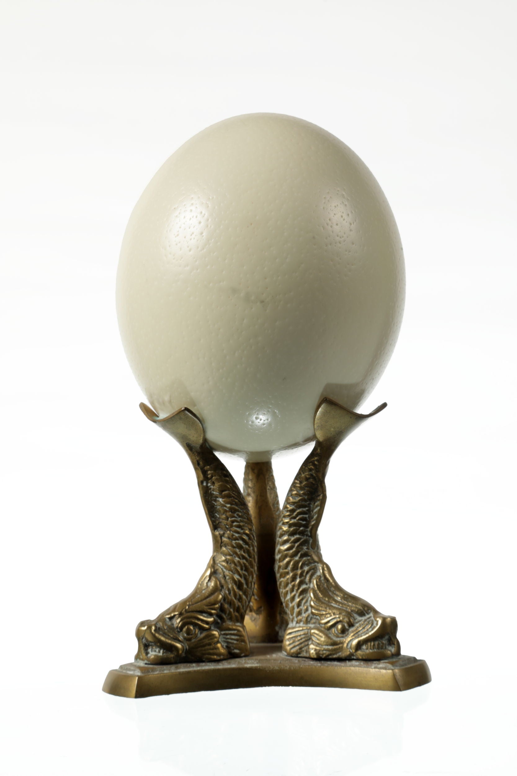 Egg centerpiece with brass base