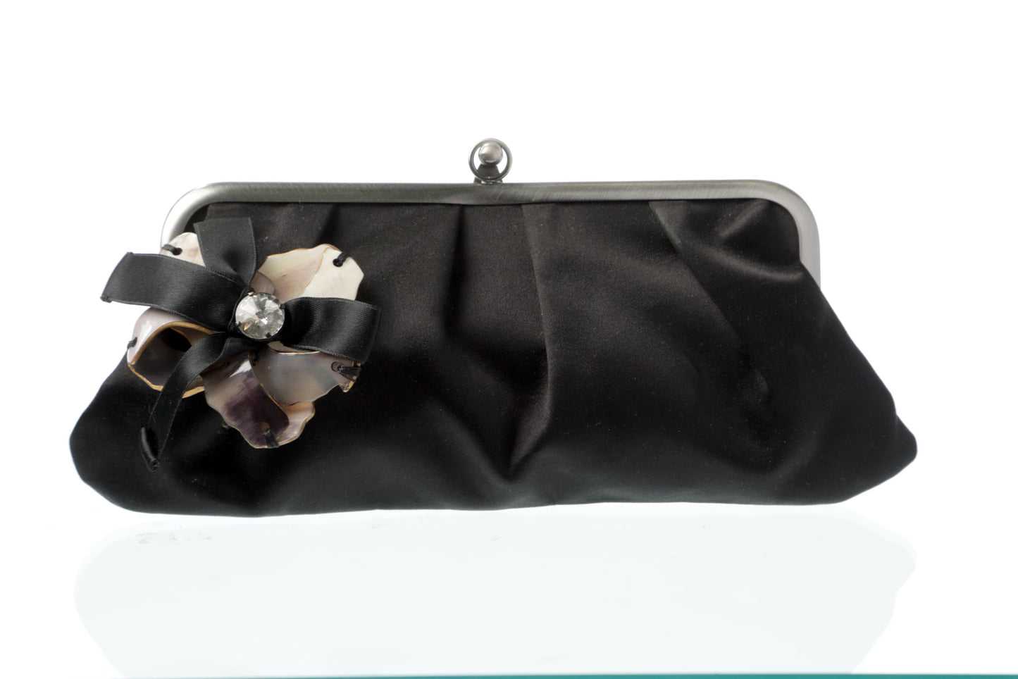 Evening clutch in black satin with floral application by Marni