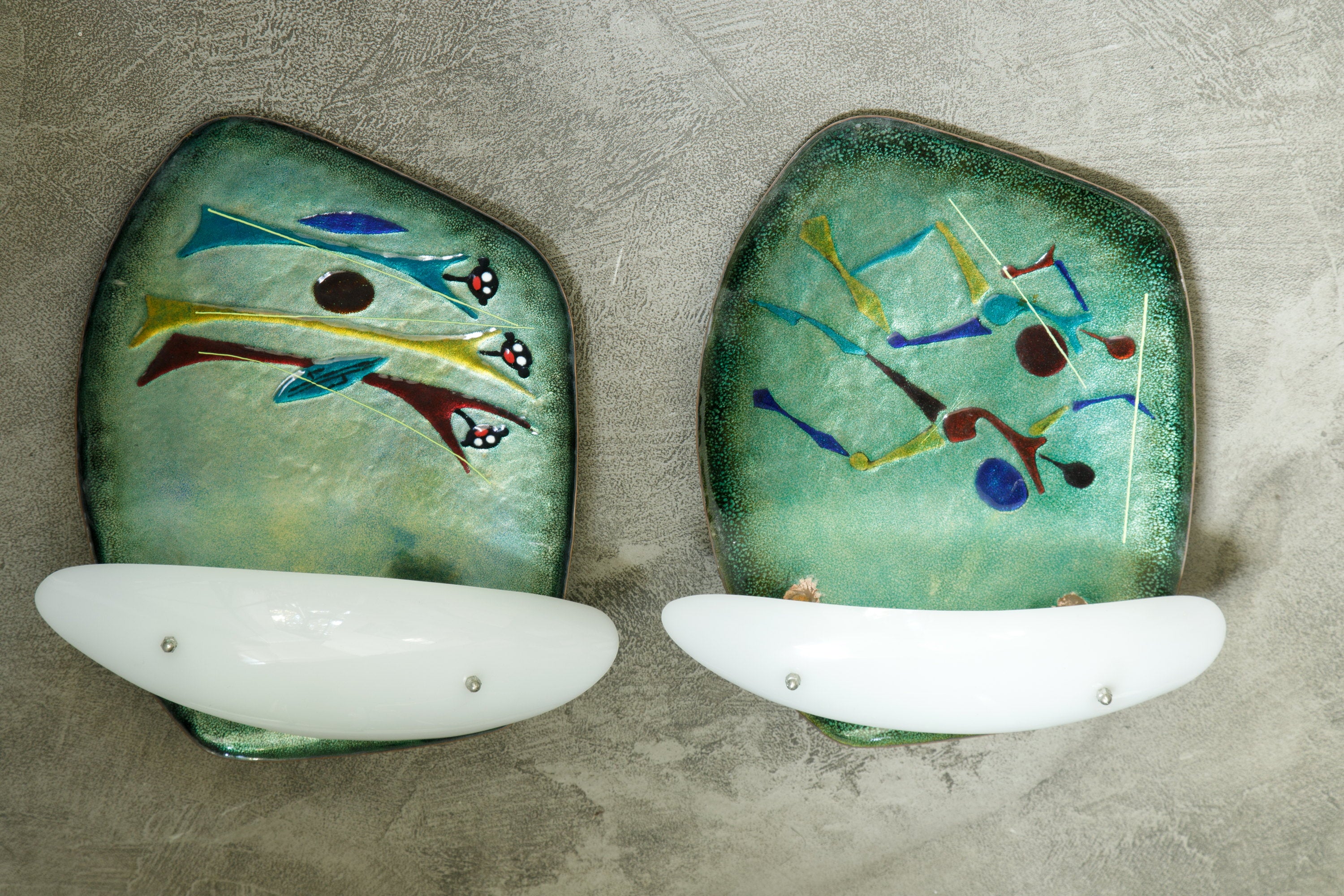 Pair of 60's enamelled wall lamps