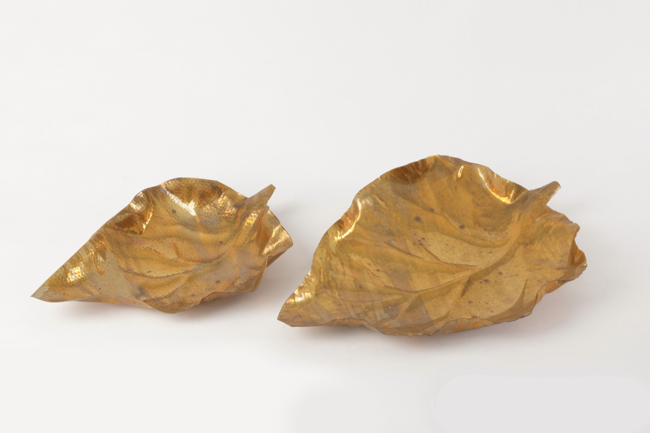 Pair of hand-hammered brass leaf centerpieces from the 1970s