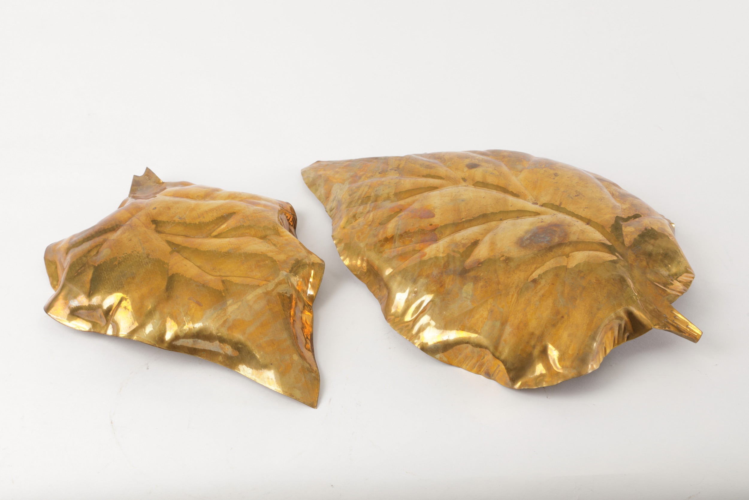 Pair of hand-hammered brass leaf centerpieces from the 1970s