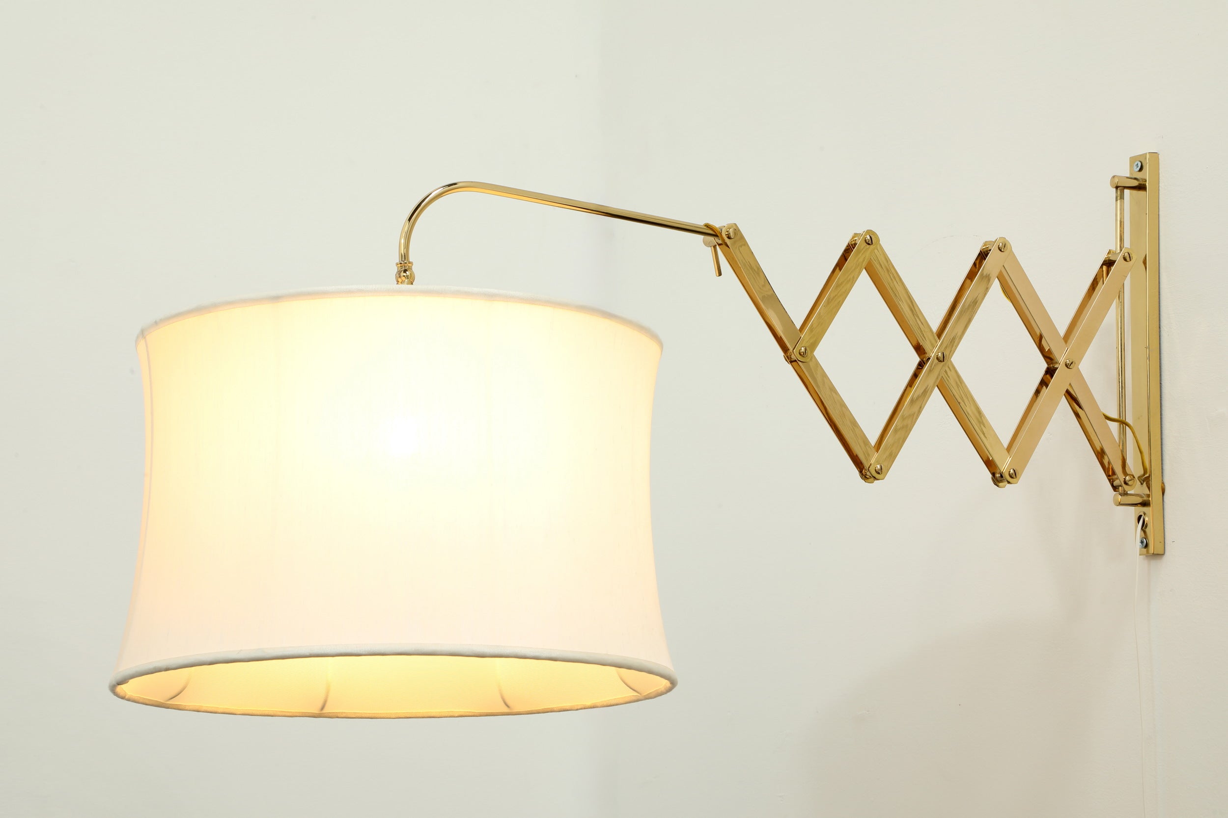 Pair of brass spring lamps from the 70s