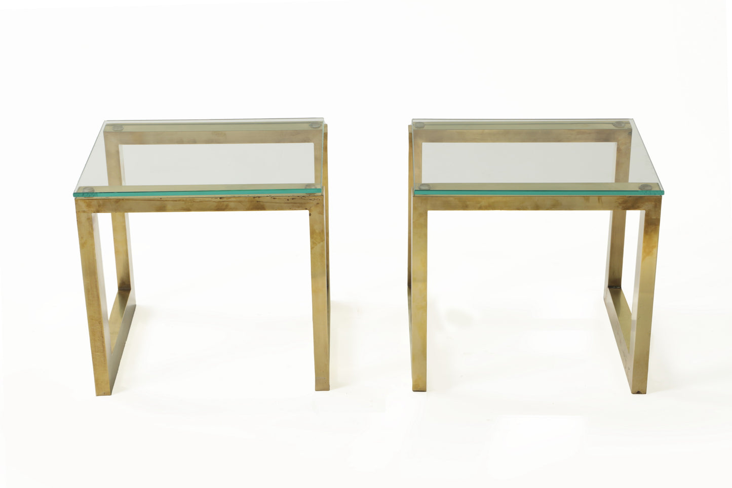 Pair of 70's brass and glass tables