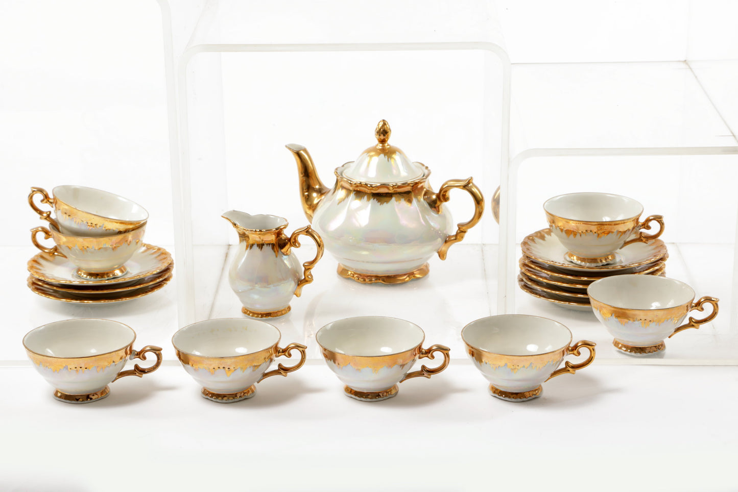 Porcelain tea service with gold flaming